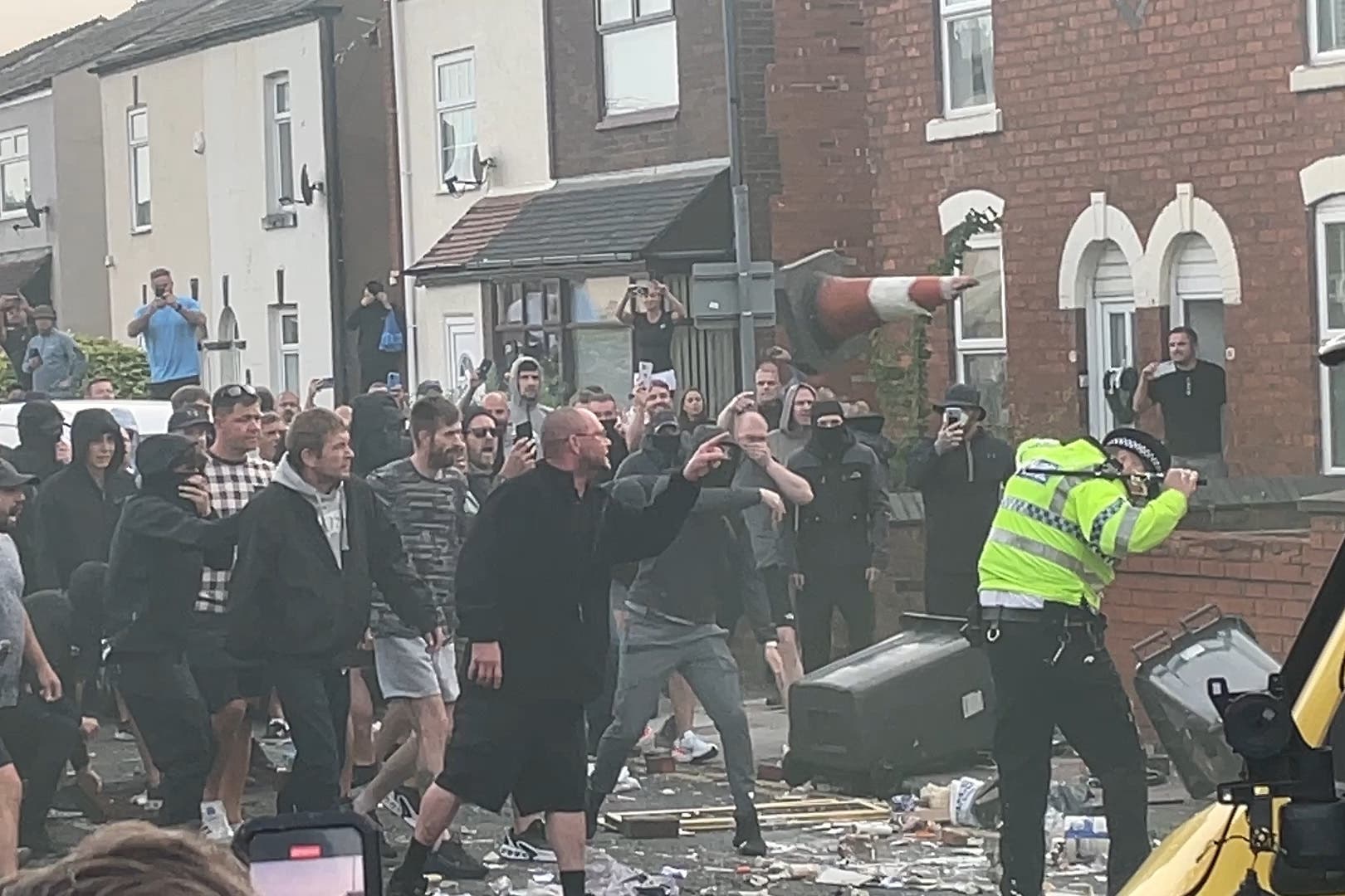 Rioters attack police during clashes in Southport on Tuesday