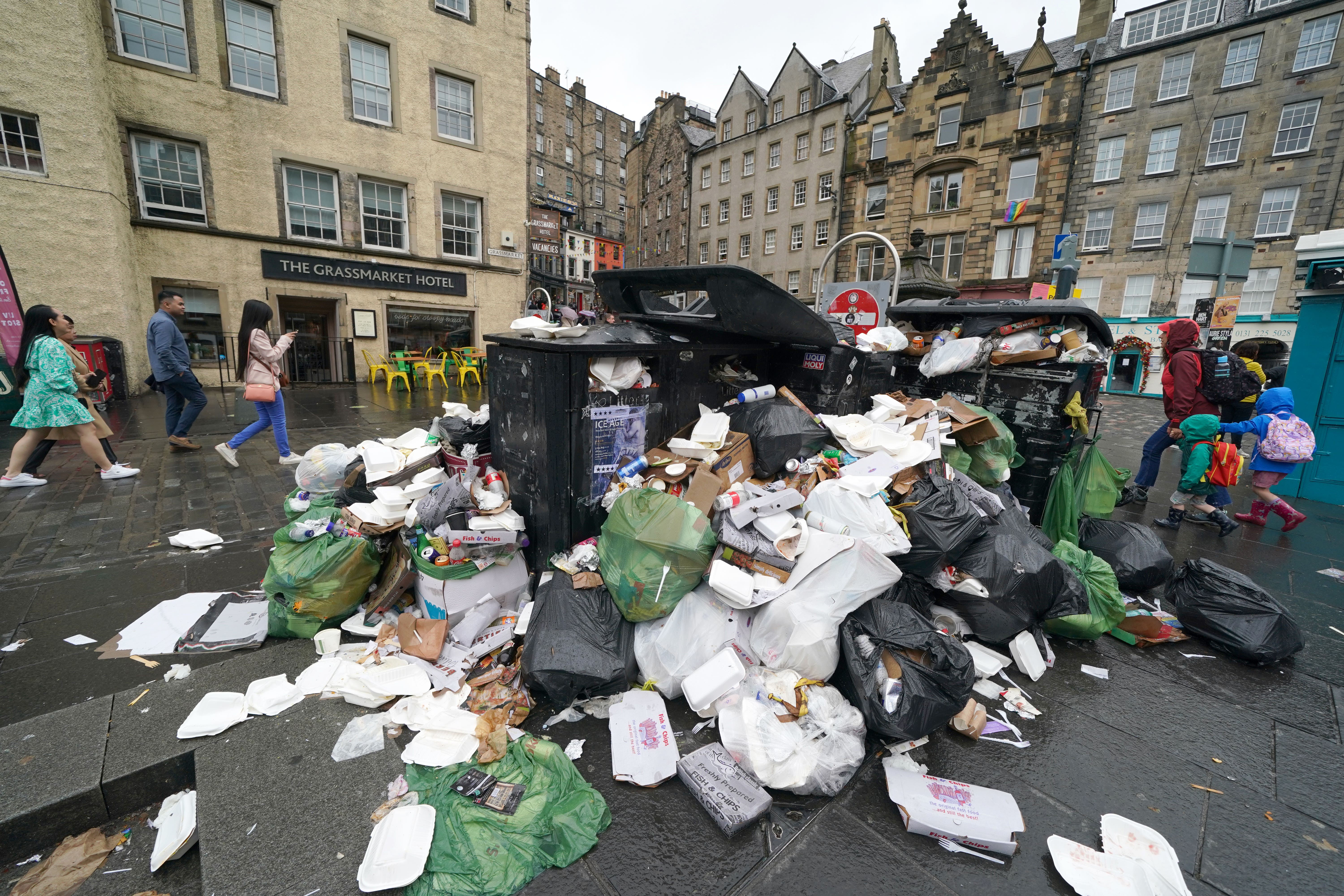 Union chiefs have already warned of the prospect of a ‘stinking summer’ as rubbish builds up uncollected (Andrew Milligan/PA)