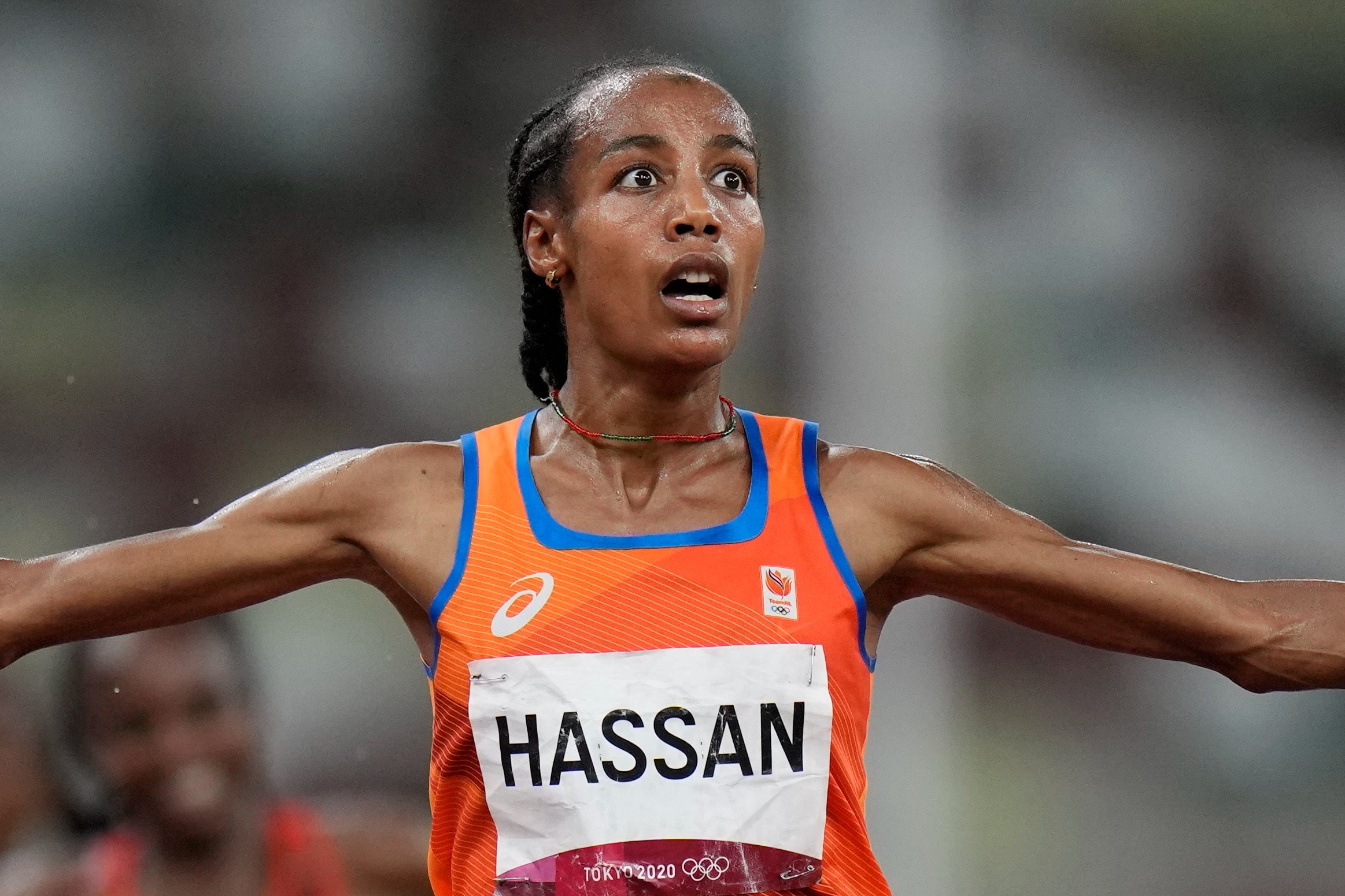 Sifan Hassan, of the Netherlands, celebrates in Tokyo