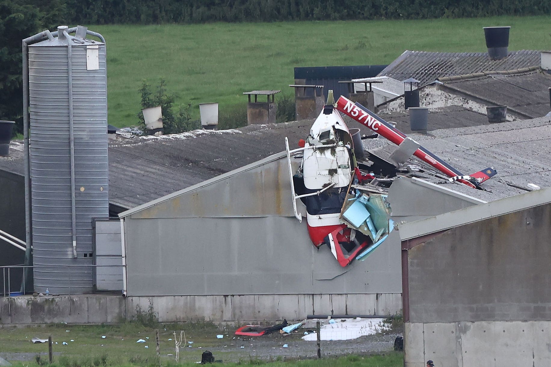 The scene near Killucan, Co Westmeath, after a helicopter crashed into a farm building (PA)