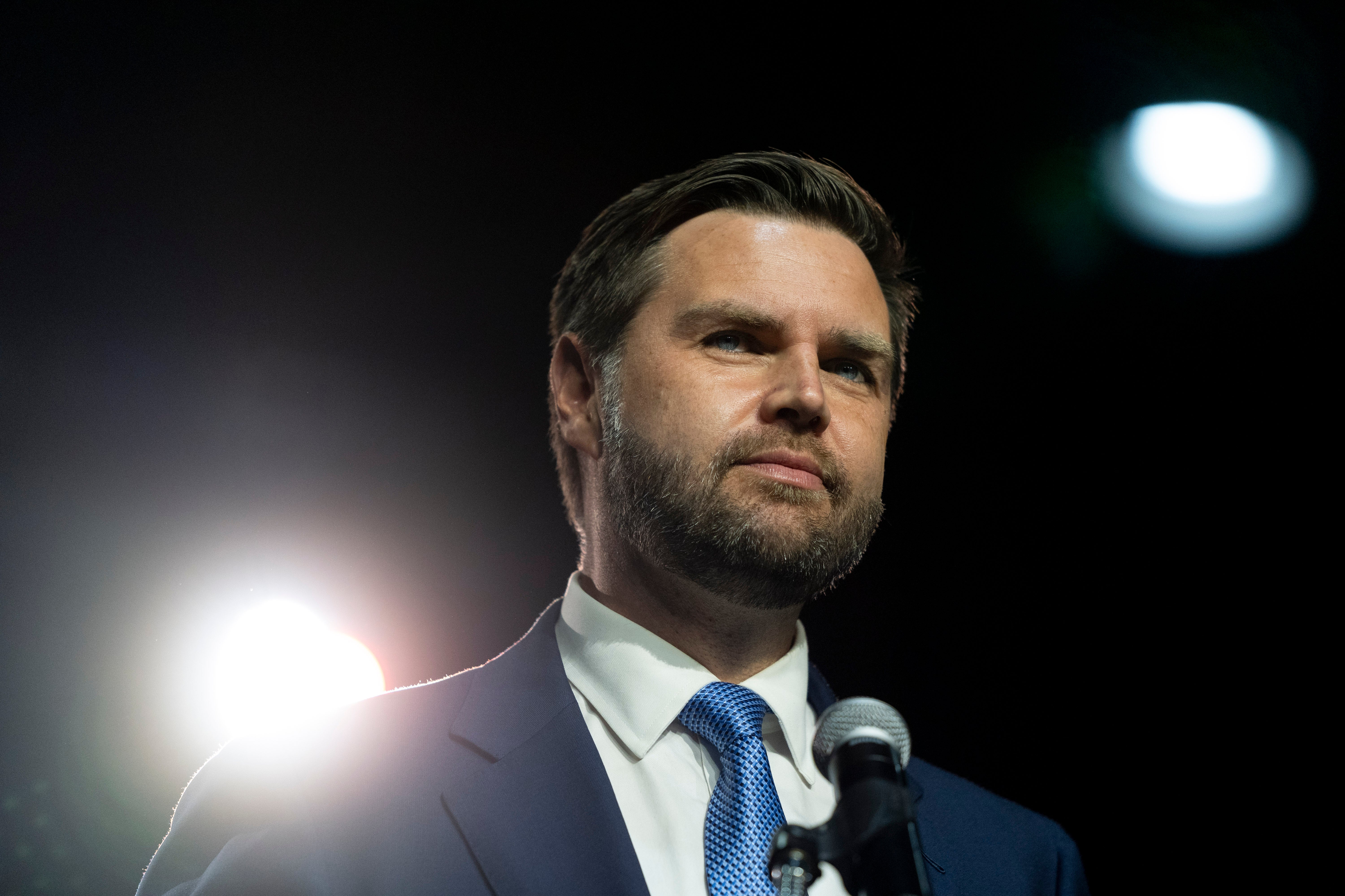 Republican vice presidential candidate Sen. JD Vance, R-Ohio, pauses for a moment while speaking at a campaign event in Reno, Nevada. He has shrugged off concerns about his previous comments.