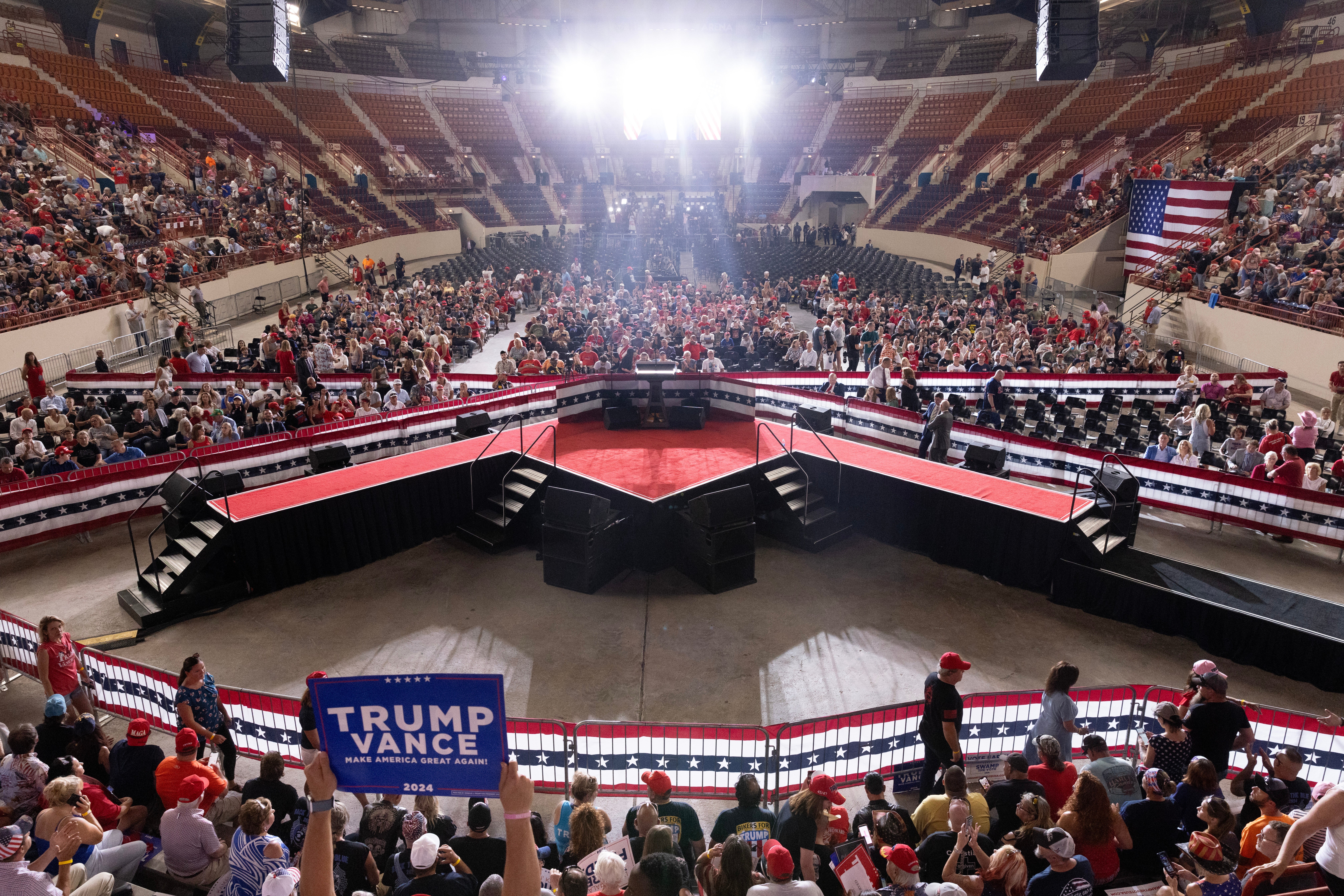 Supporters of former US President Donald J Trump gather for a Trump rally at New Holland Arena in Harrisburg, Pennsylvania