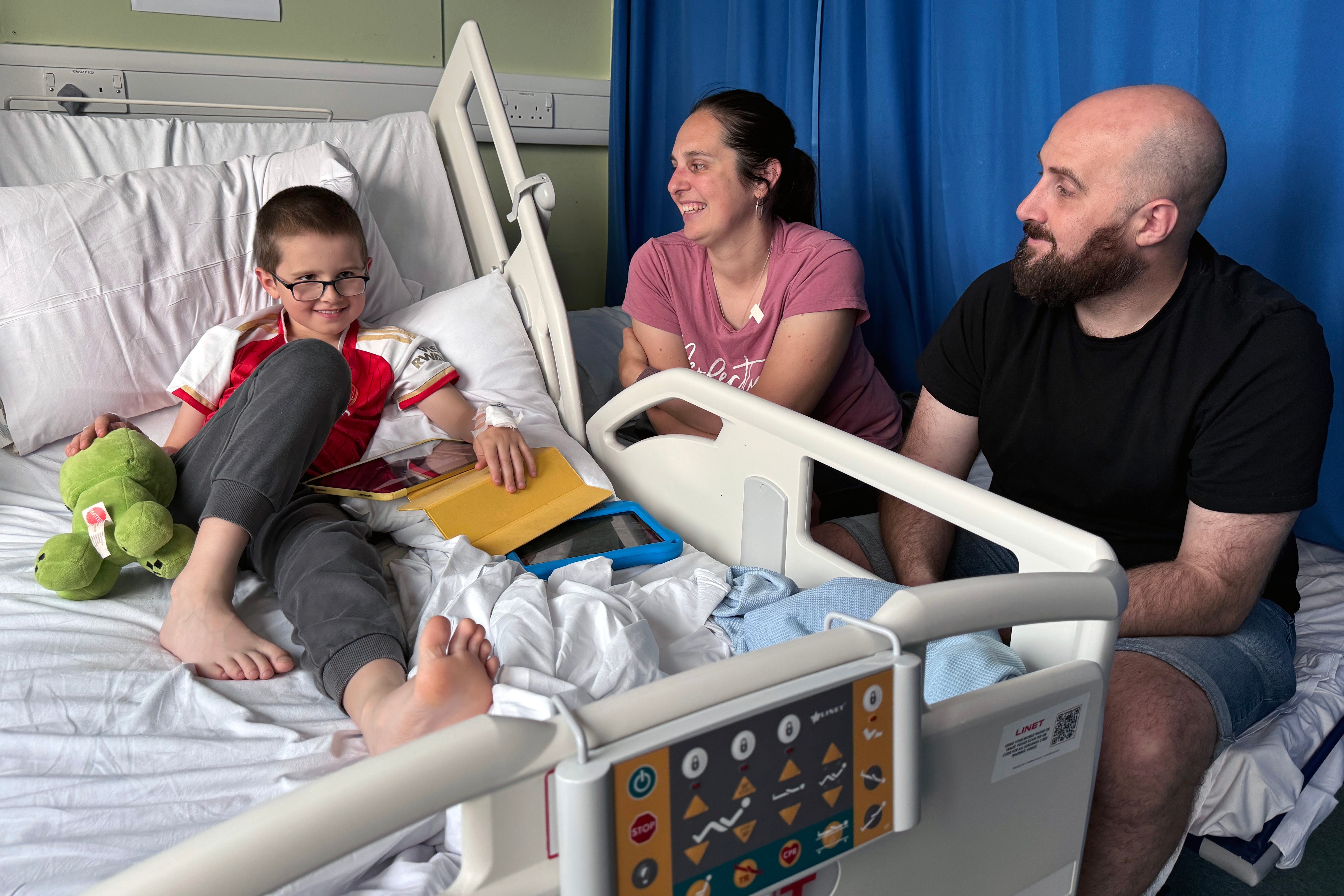 Seven-year-old Reece Wilton, from Hampshire, has become the first patient in the UK to undergo robotic surgery for a kidney condition (University Hospital Southampton/PA)