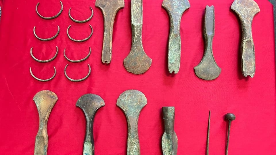 Arm rings, axes, pins and a spearhead made of bronze uncovered at the site