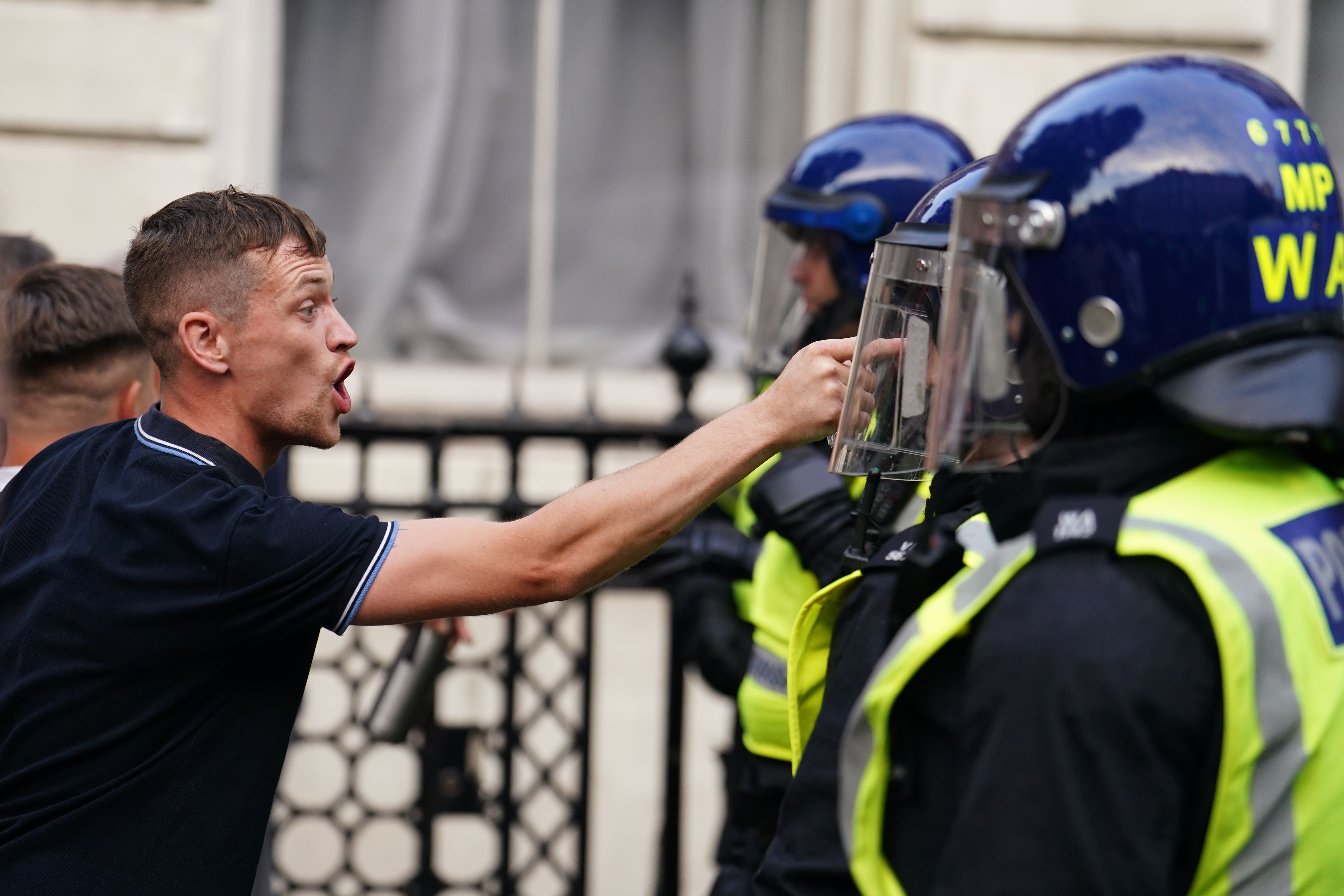 A demonstration outside Downing Street descended into violence as protesters threw bottles at police officers on Wednesday (Jordan Pettitt/PA)