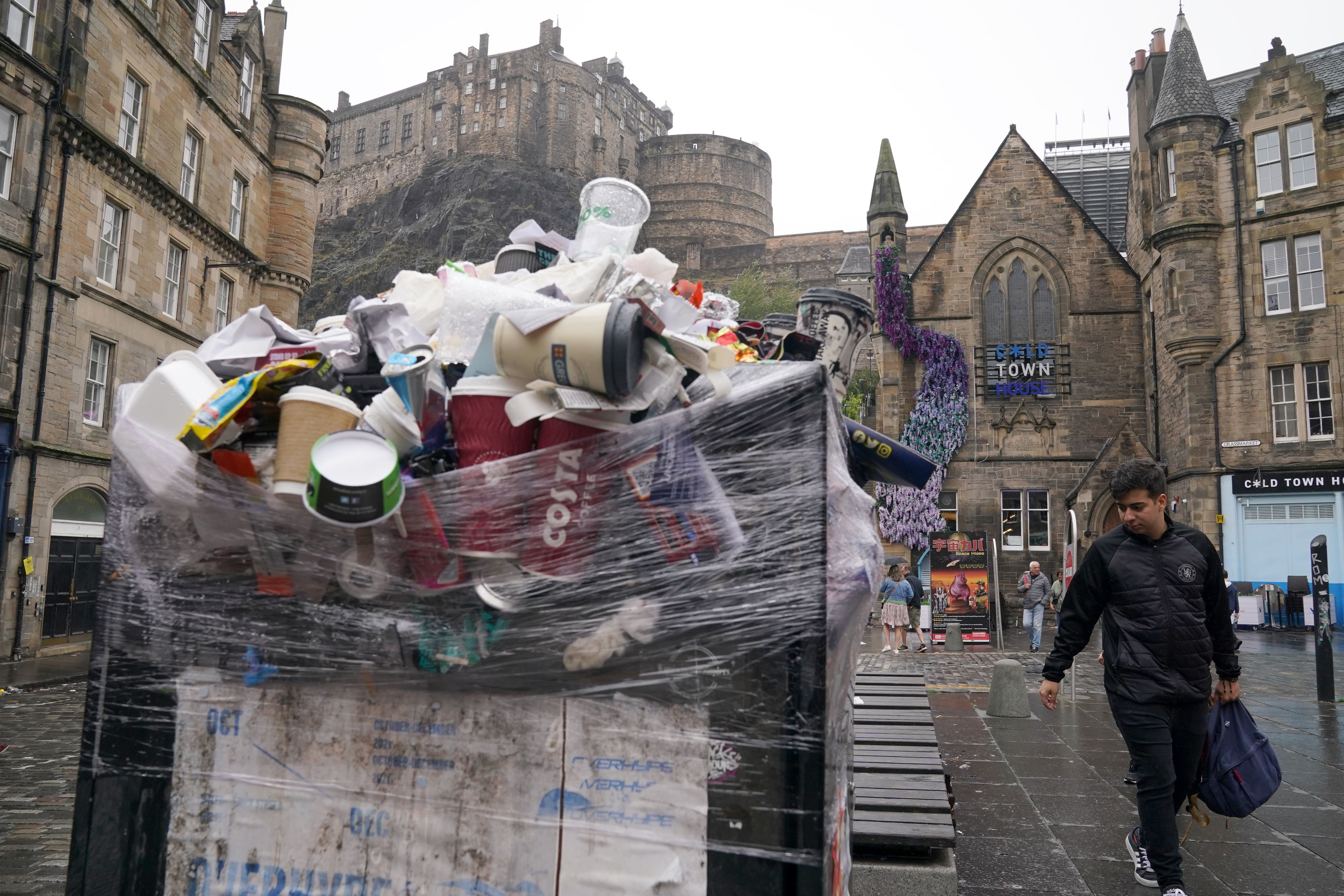 John Swinney and his Government has been urged to intervene to prevent a strike by refuse workers across Scotland (PA)