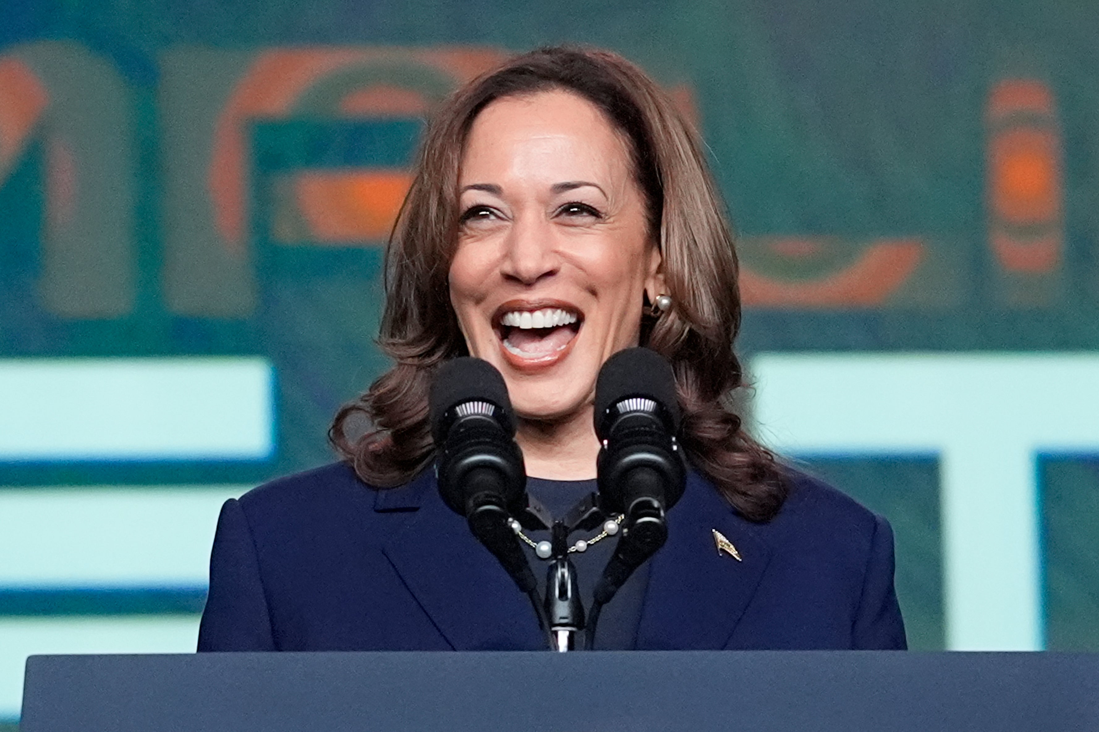 Harris delivers remarks at a Sigma Gamma Rho Sorority gathering in Houston hours after Trump questioned her background.