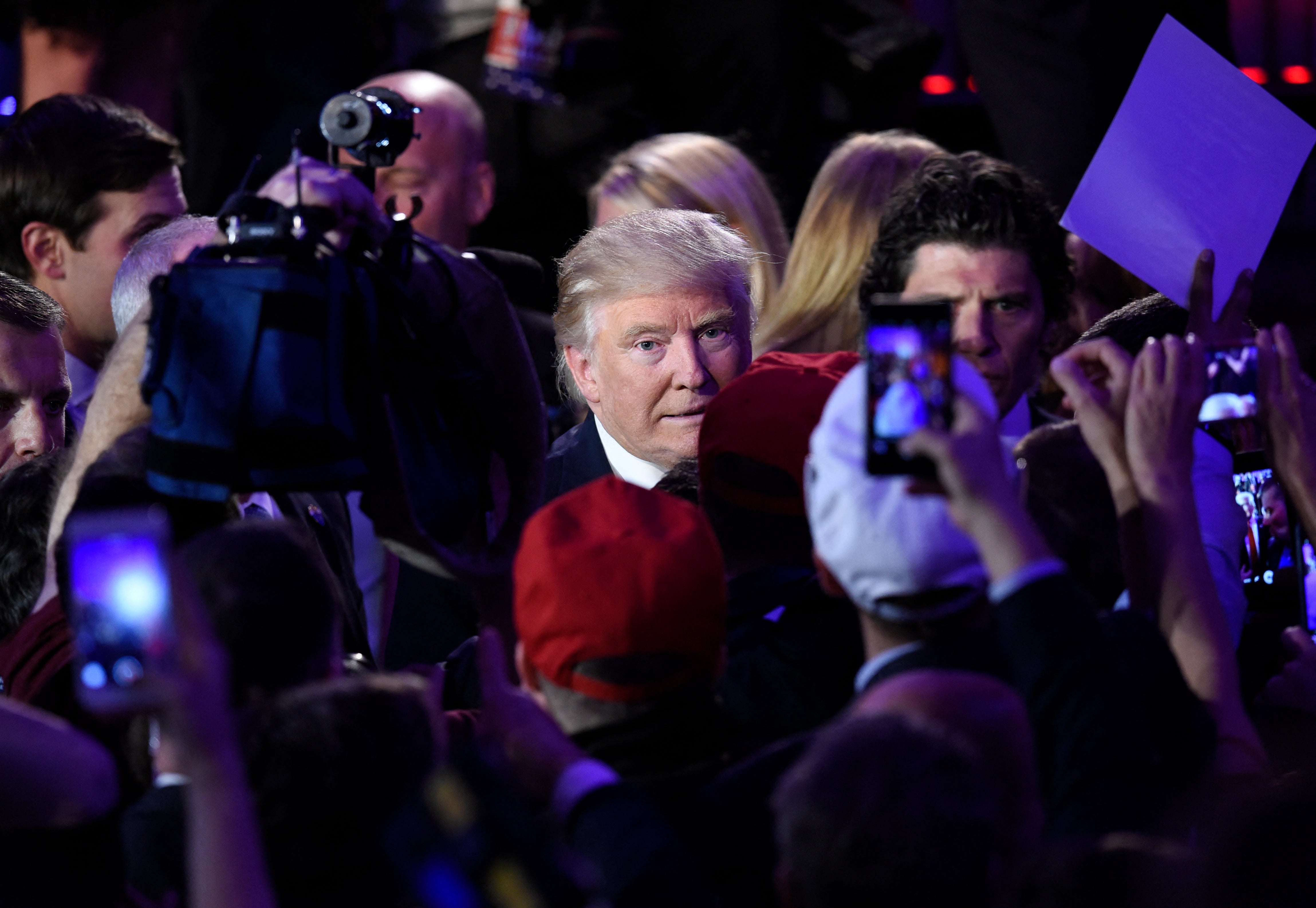 US President-elect Donald Trump greets supporters after speaking at the New York Hilton Midtown in New York on November 8, 2016