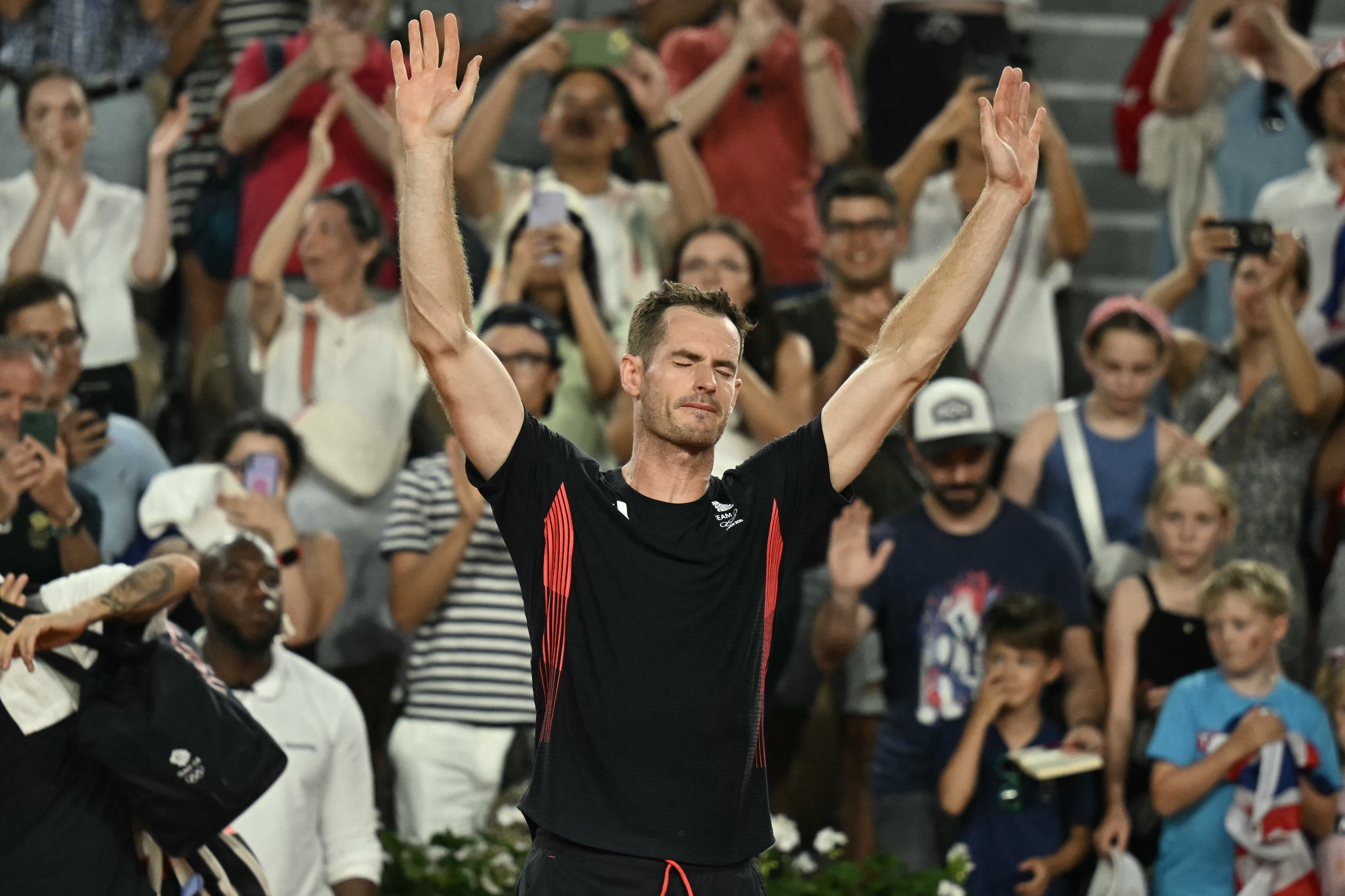 Murray receives a standing ovation as he leaves the tennis court for the final time