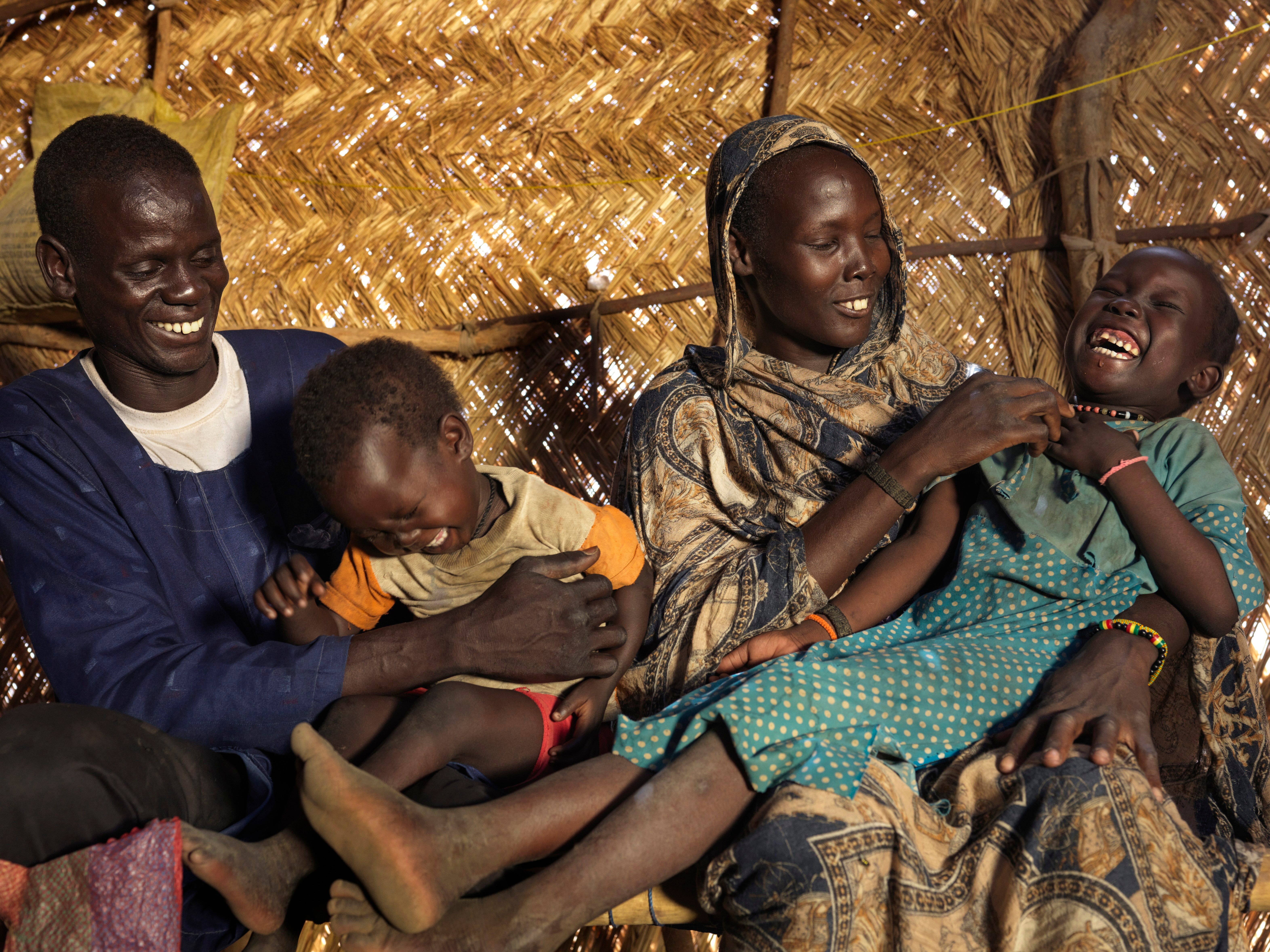 Nyibol Mathiang Deng, 27, reunites with her husband and two oldest daughters