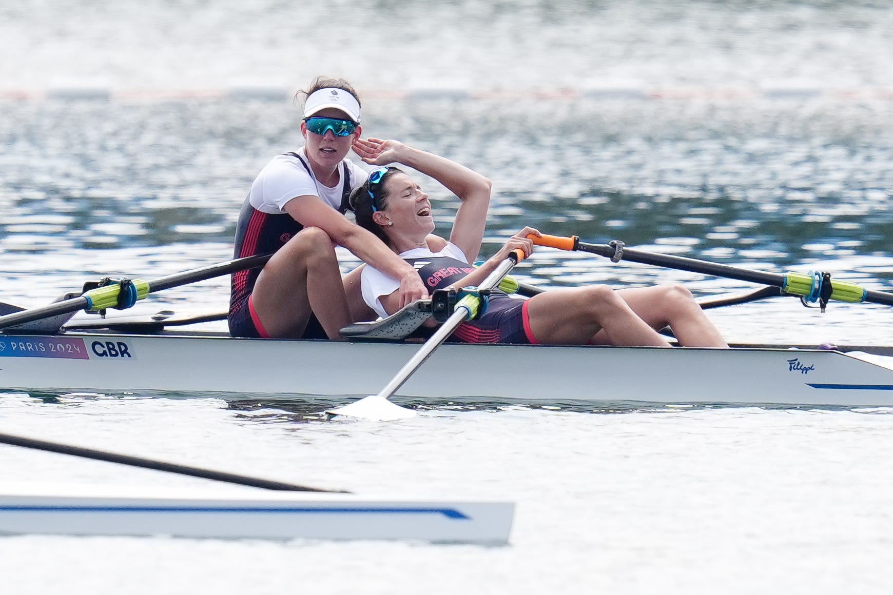 Great Britain’s Emily Craig and Imogen Grant celebrate winning gold in the women’s lightweight double sculls at Paris 2024 (John Walton/PA)