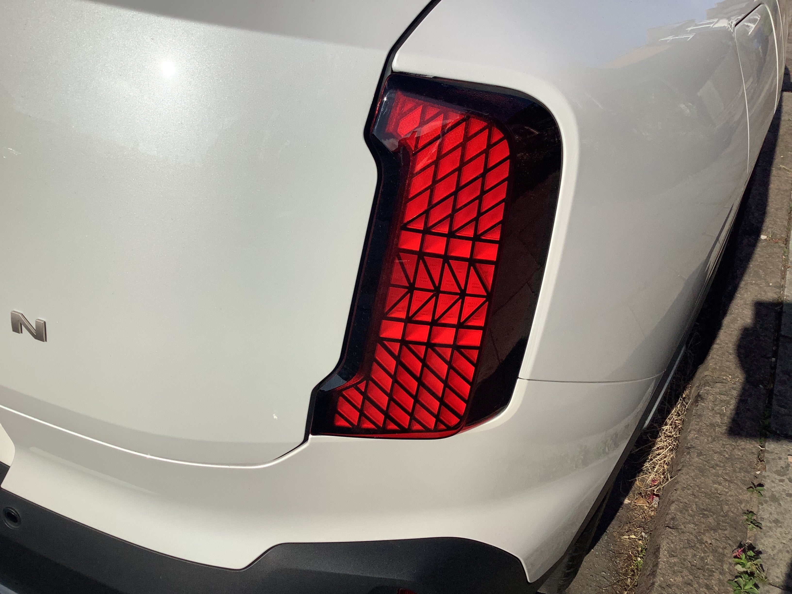 The stacked rear lights bring to mind a touch of Range Rover styling