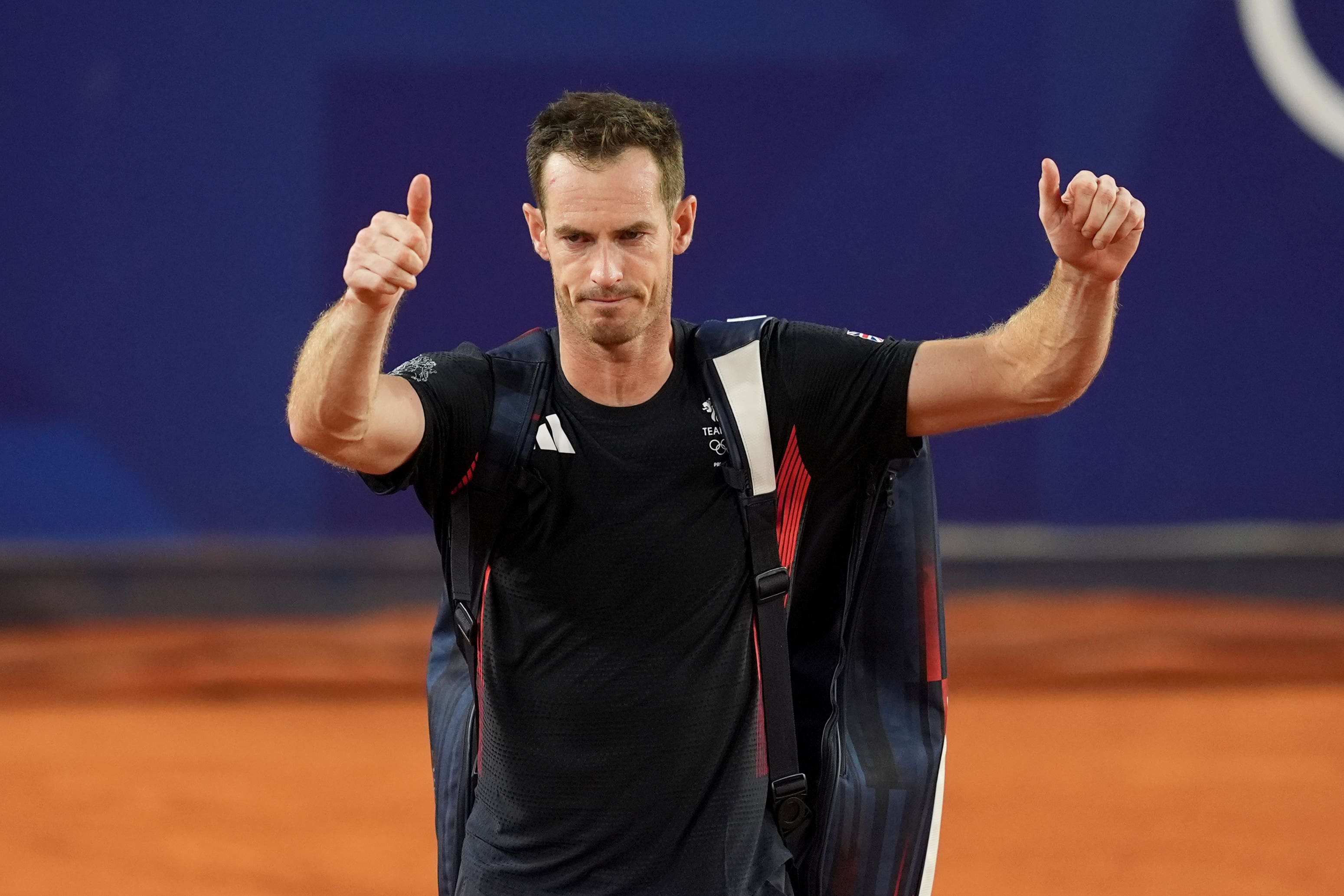 Andy Murray gives a thumbs up to the crowd as he bids farewell (Martin Rickett/PA)