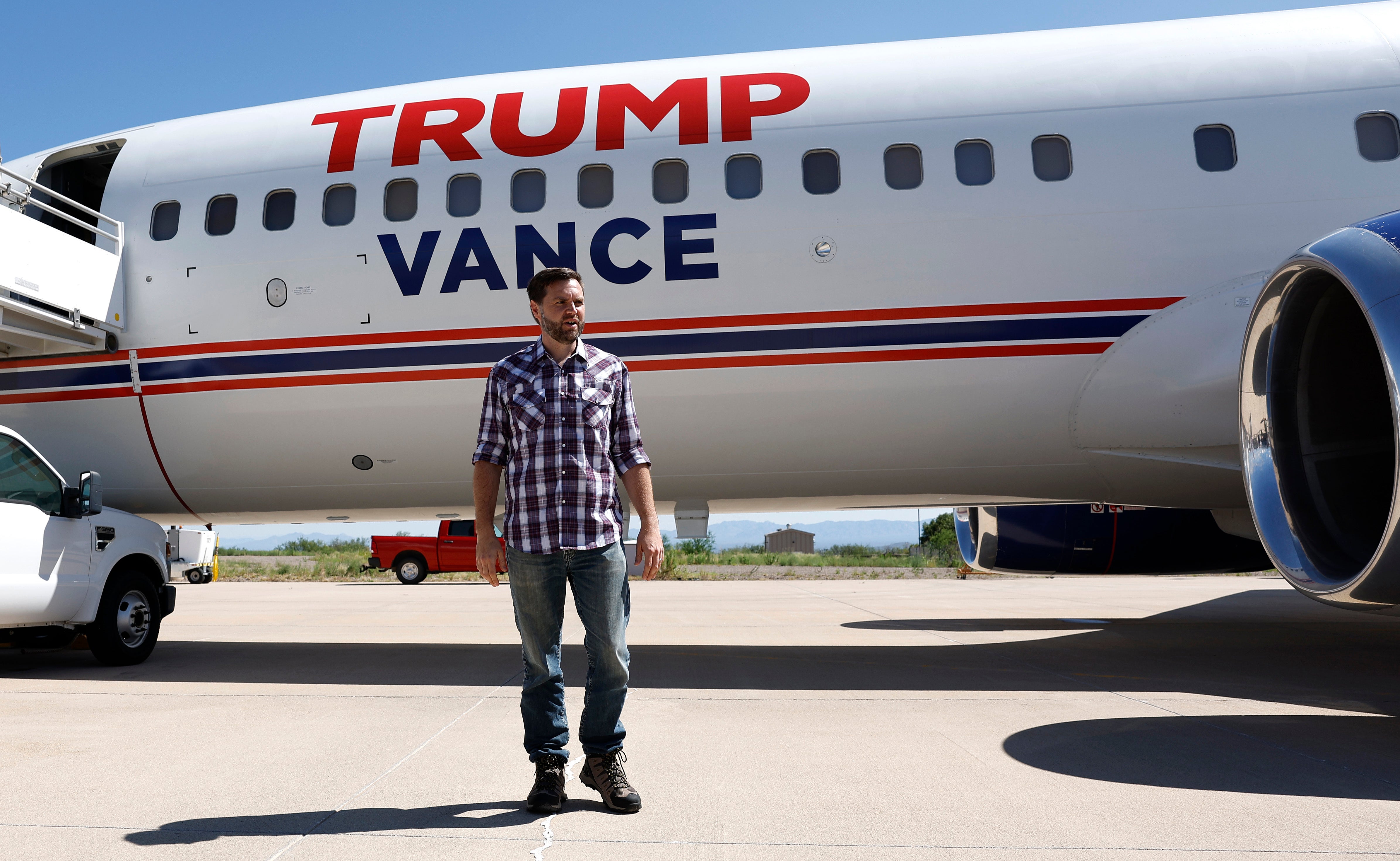 JD Vance prepares to board a plane after visiting the US-Mexico border on August 1.