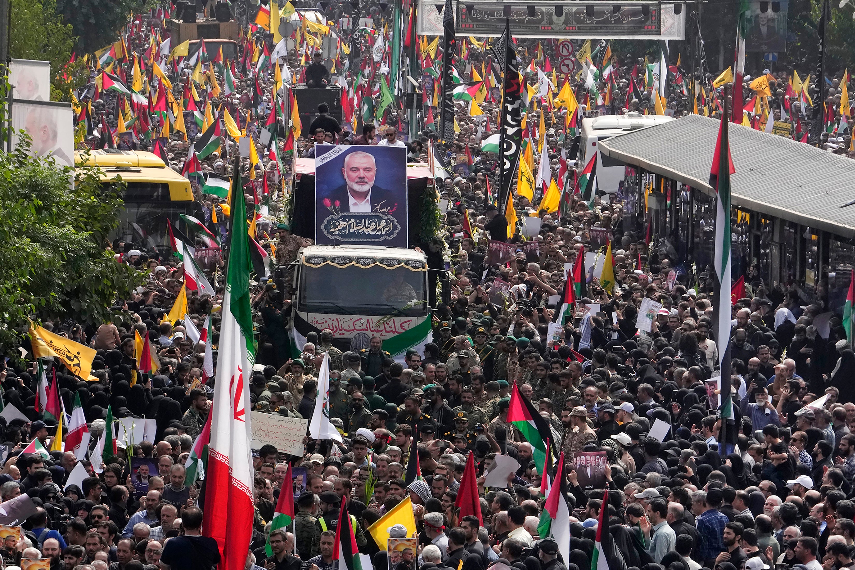 Iranians attend the funeral procession of assassinated Hamas chief, Ismail Haniyeh