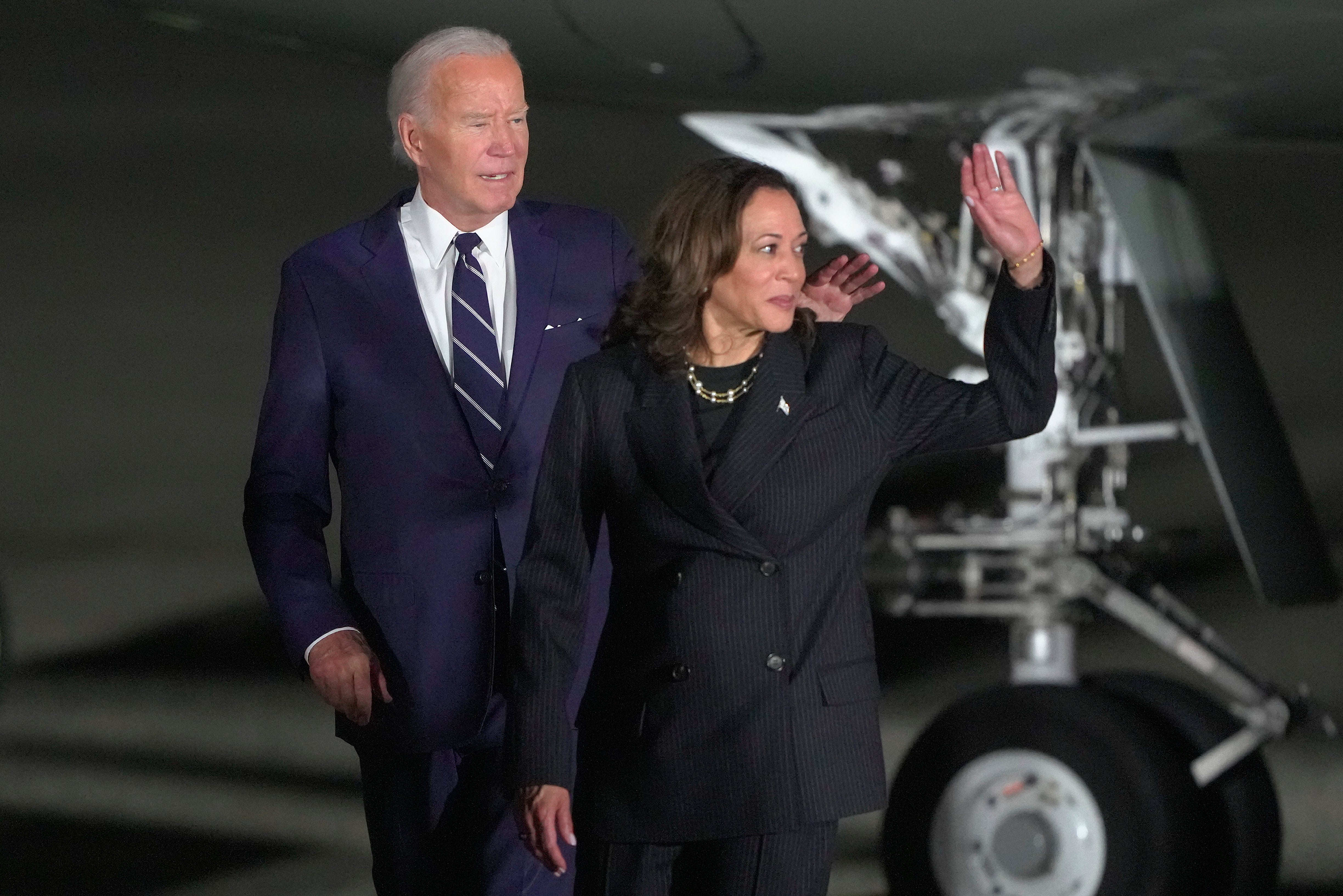 President Joe Biden and vice president Kamala Harris walking across the tarmac after greeting reporter Evan Gershkovich, Alsu Kurmasheva and Paul Whelan at Andrews Air Force Base, Md., following their release as part of a 24-person prisoner swap between Russia and the United States, Friday August 2 2024