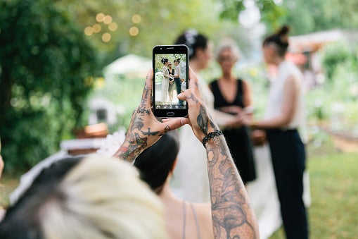 Groom questions whether he was wrong to crop sister-in-law out of wedding photos