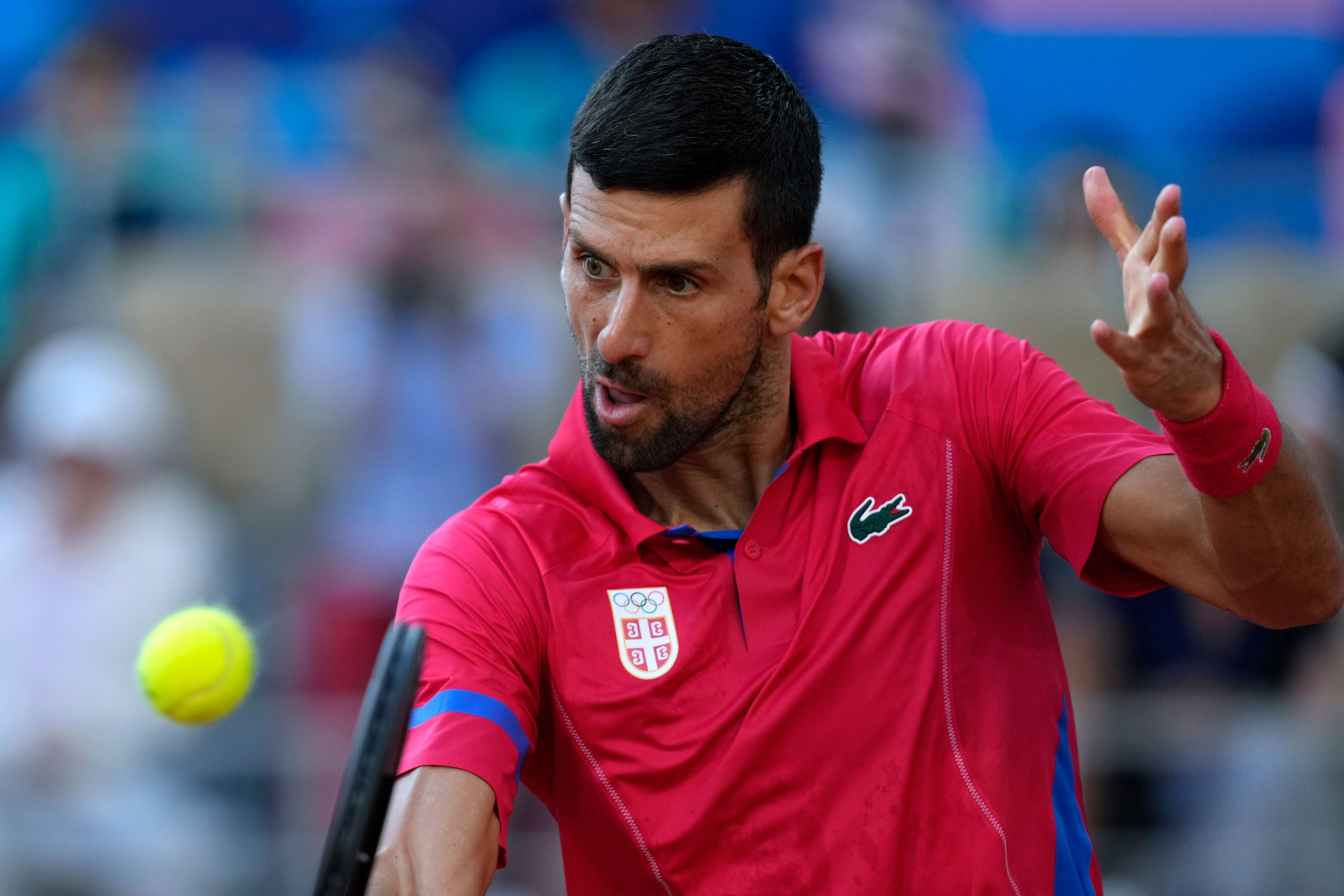 Novak Djokovic is through to a first Olympic final (Andy Wong/AP)