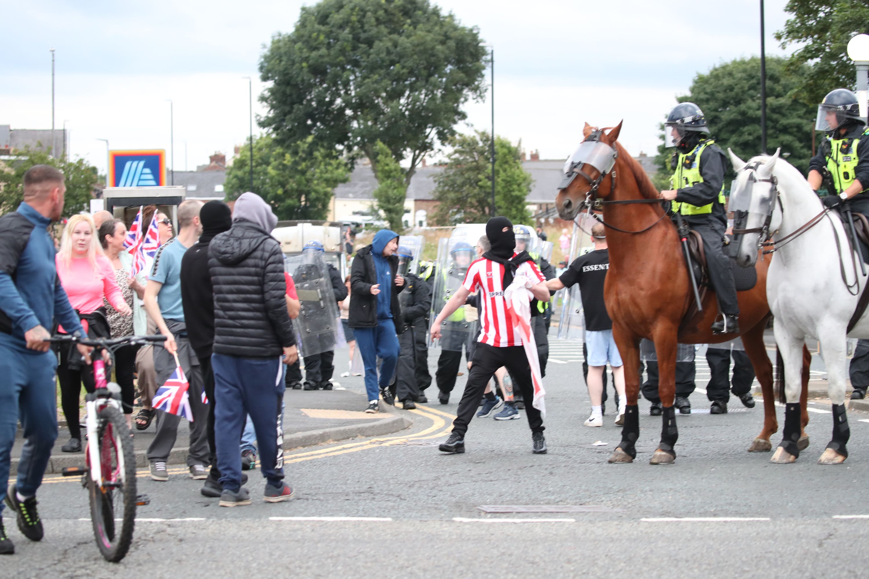 People protest in Sunderland city centre following the stabbing attacks on Monday in Southport (Scott Heppell/PA)