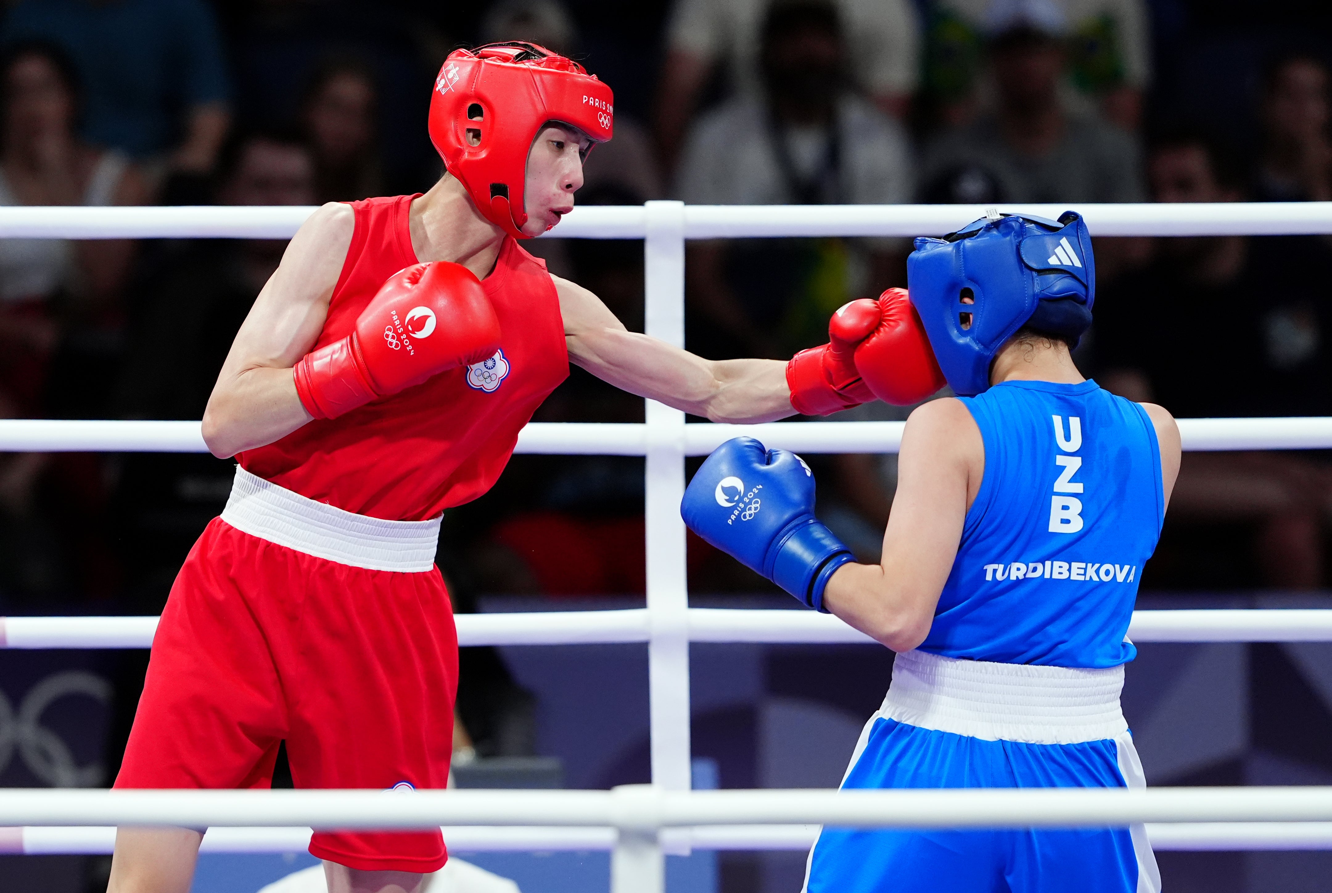 Lin Yu Ting (left) is one of two boxers at the centre of the row (Peter Byrne/PA)