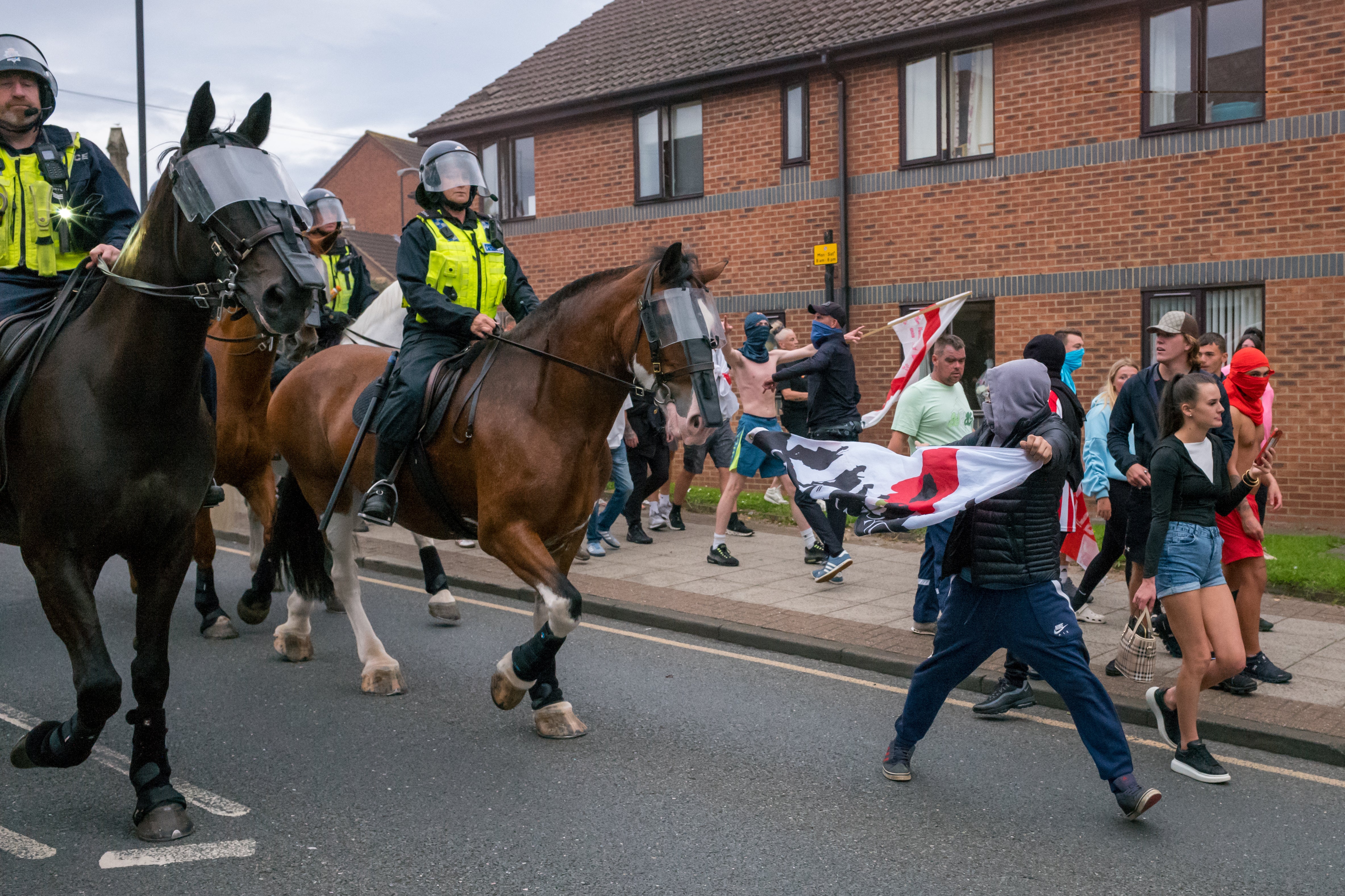 Far-right thugs clash with police officers in Sunderland