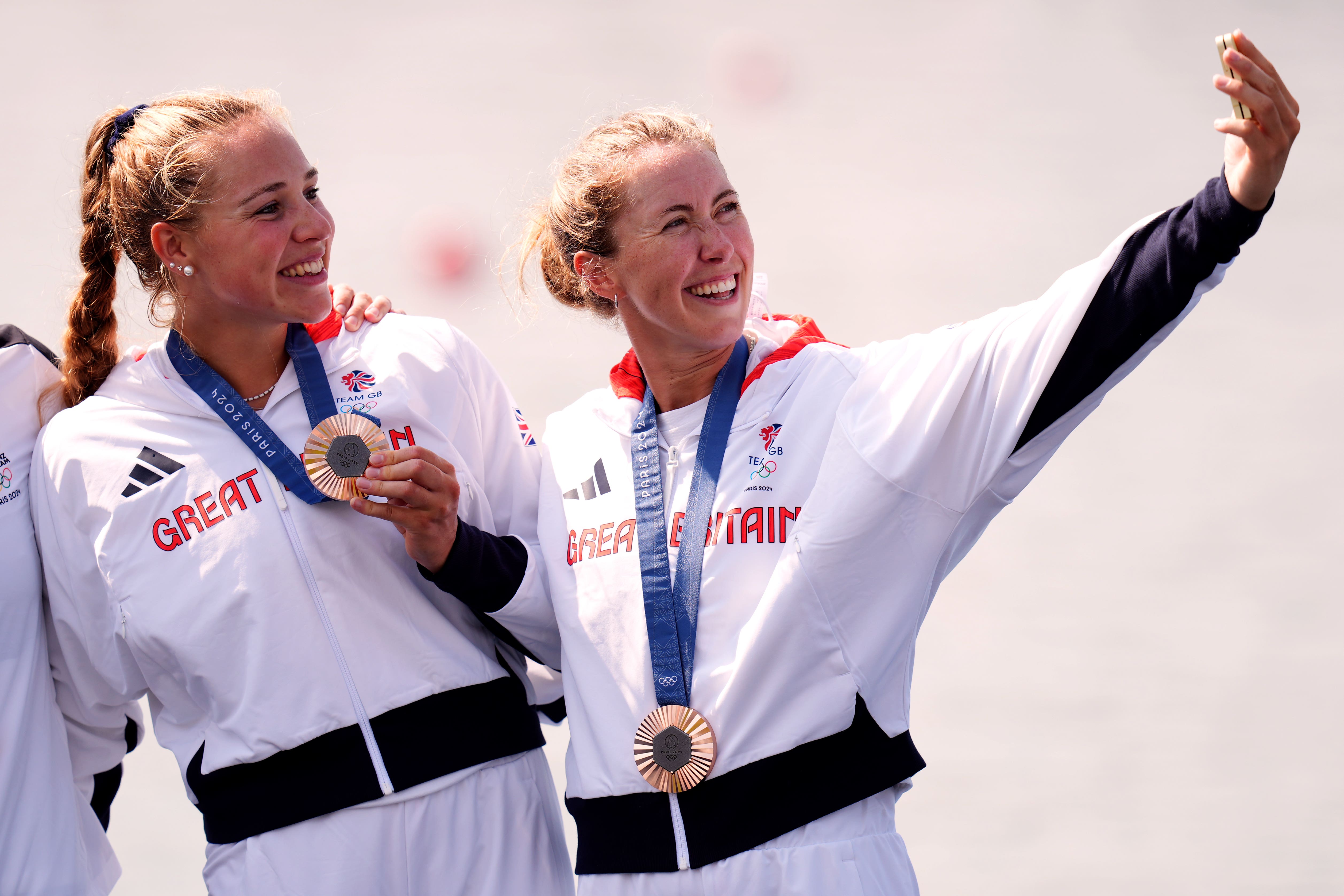 Great Britain’s Mathilda Hodgkins-Byrne and Rebecca Wilde take a selfie as they receive their bronze medals for the women’s rowing double sculls at the Vaires-sur-Marne Nautical Stadium on the sixth day of the 2024 Paris Olympic Games in France (John Walton/PA)