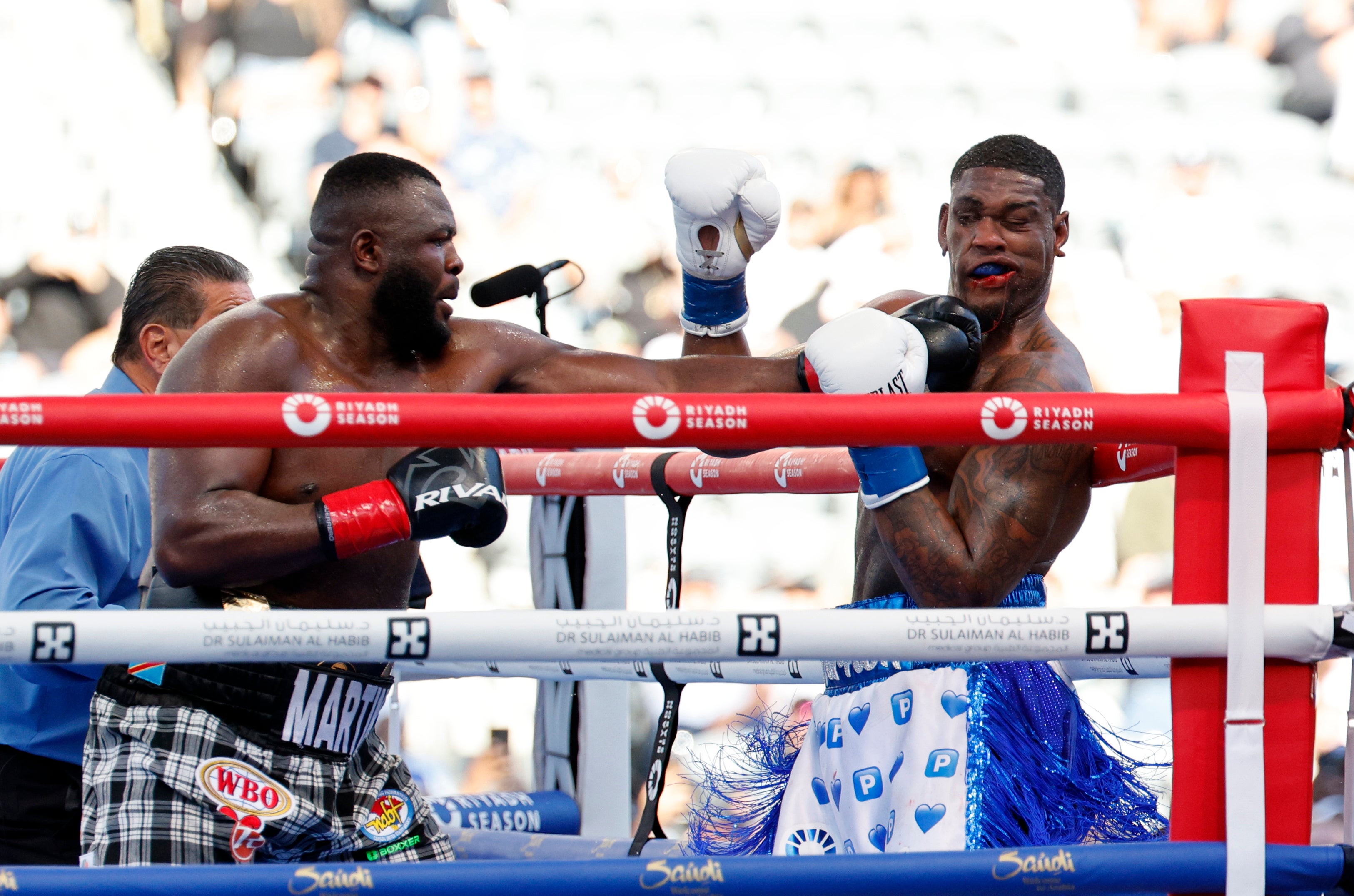 Martin Bakole (left) dropped Jared Anderson three times en route to victory