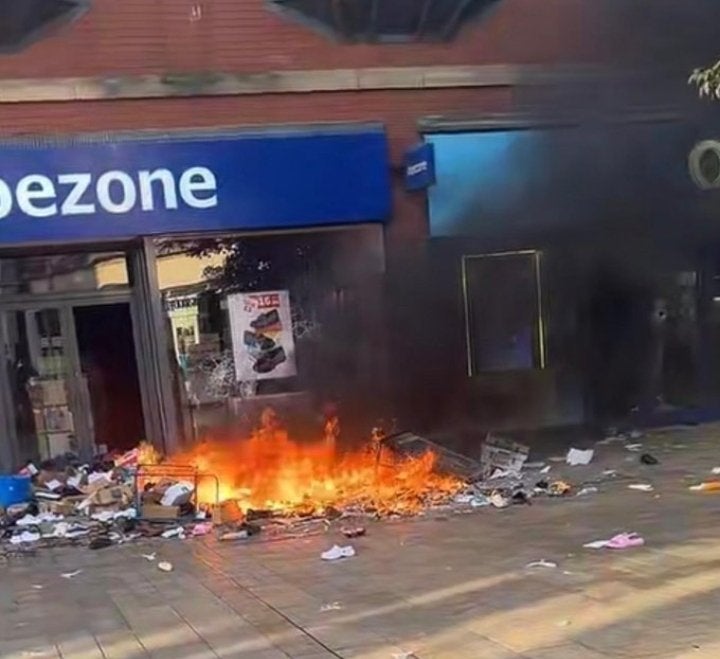 Rioters attacked and looted a Shoezone store in Hull