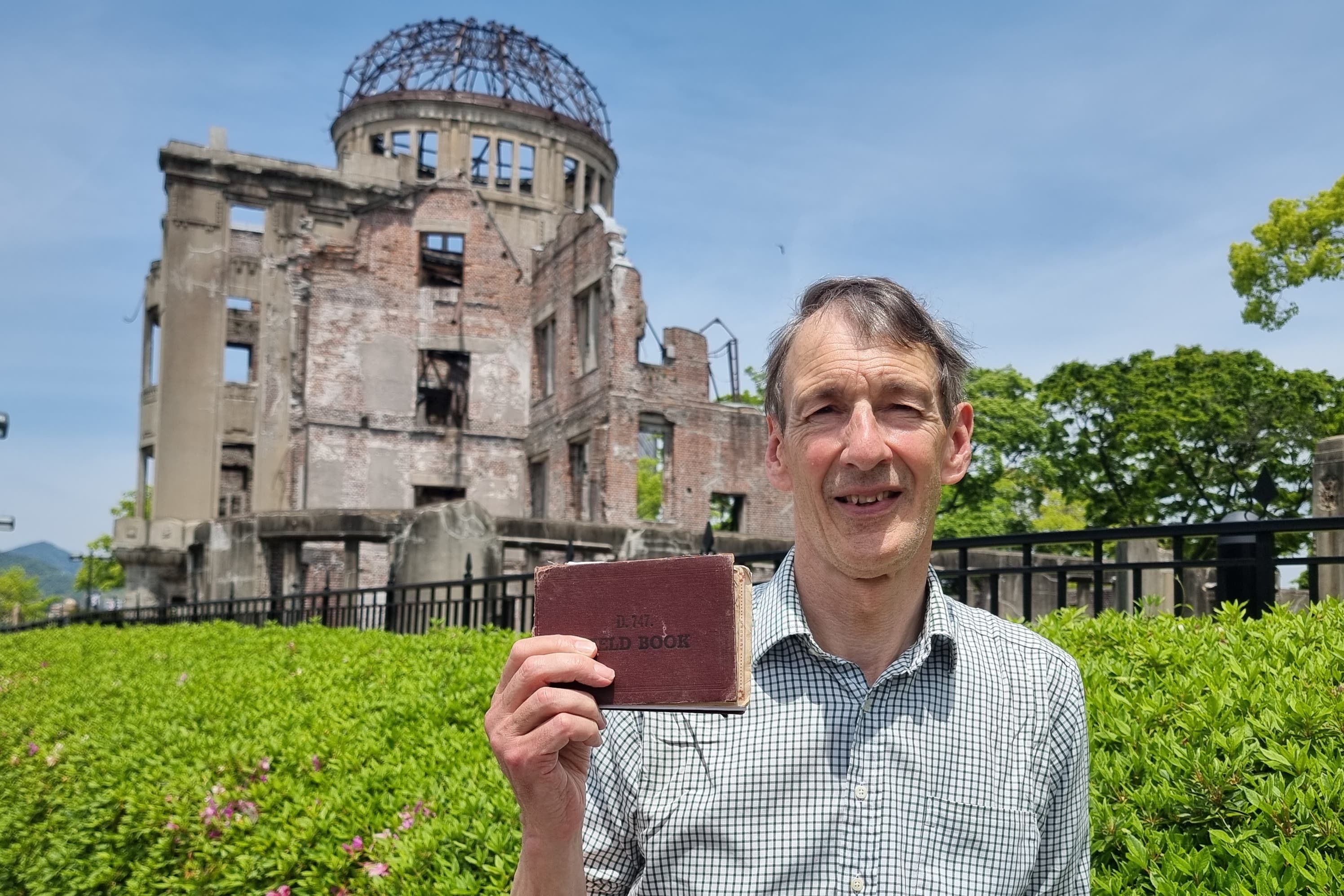 Ian Gilmour took his father’s British Army field book on a pilgrimage to Hiroshima, Japan (Handout/PA)