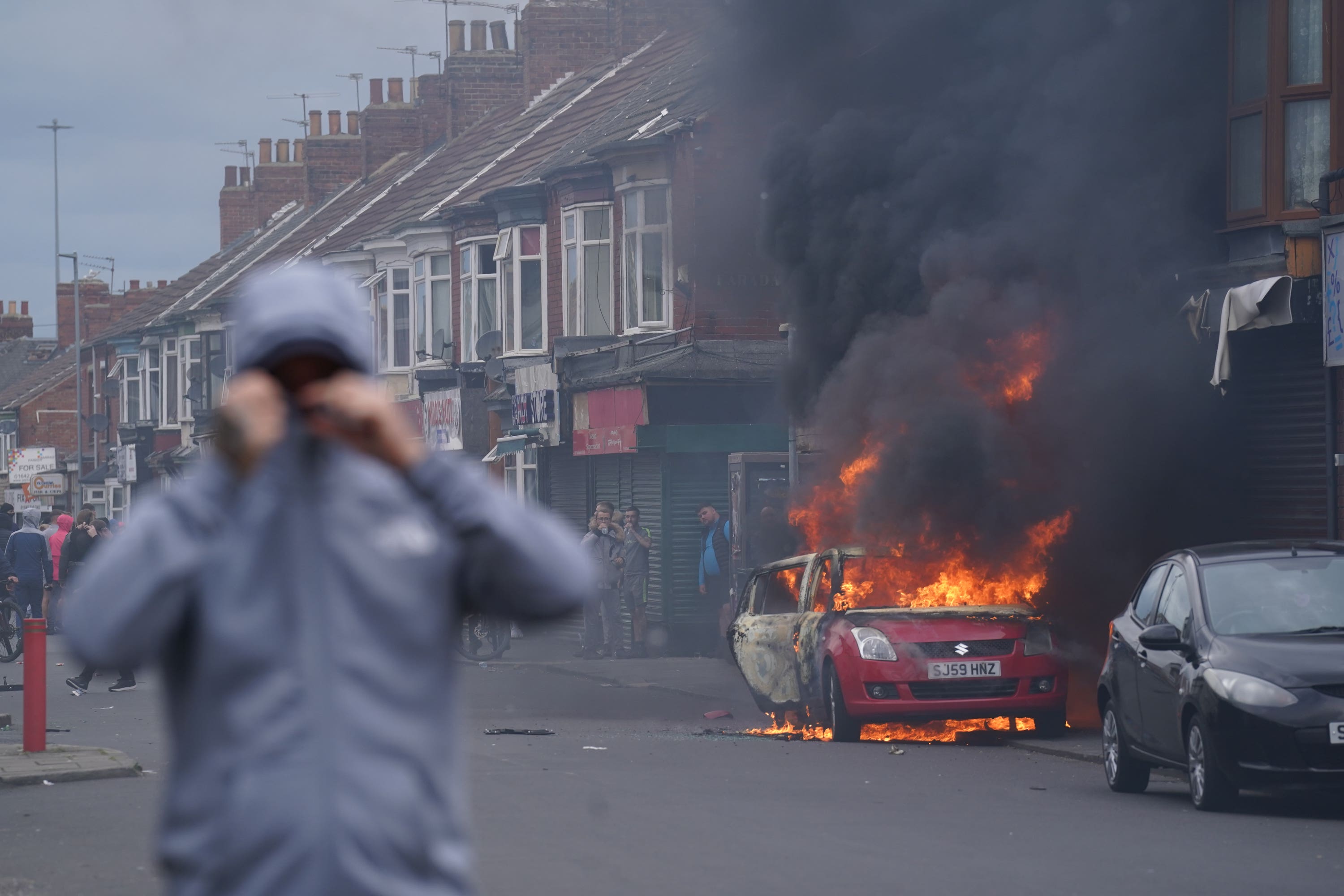 A car burns during a riot in Middlesbrough (Owen Humphreys/PA)