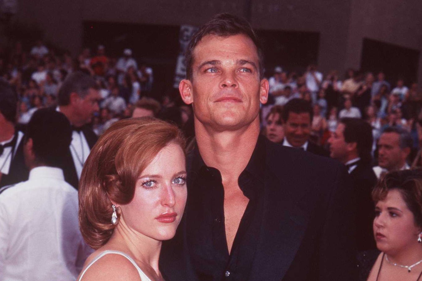 Anderson and her then-boyfriend Rodney Rowland at the Emmy Awards in 1997