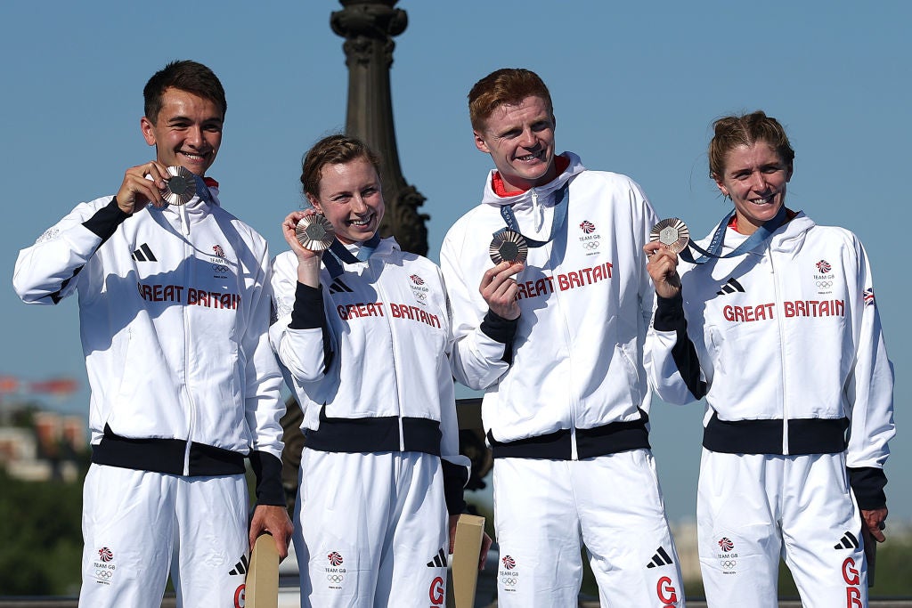 Team GB with their bronze medal after a photo finish in the mixed triathlon relay