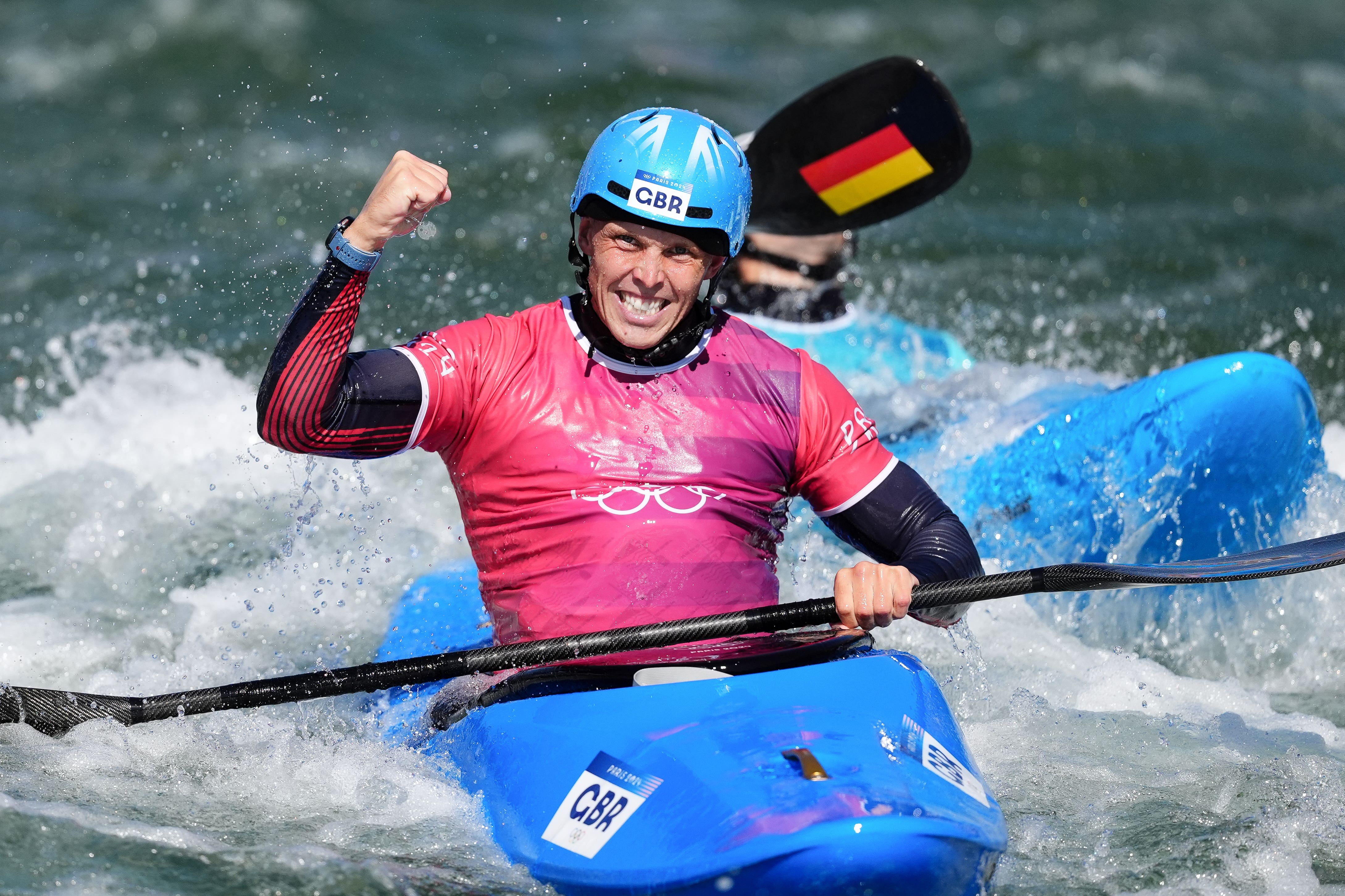 Great Britain’s Joe Clarke celebrates winning silver in the men’s kayak cross final (John Walton/PA).