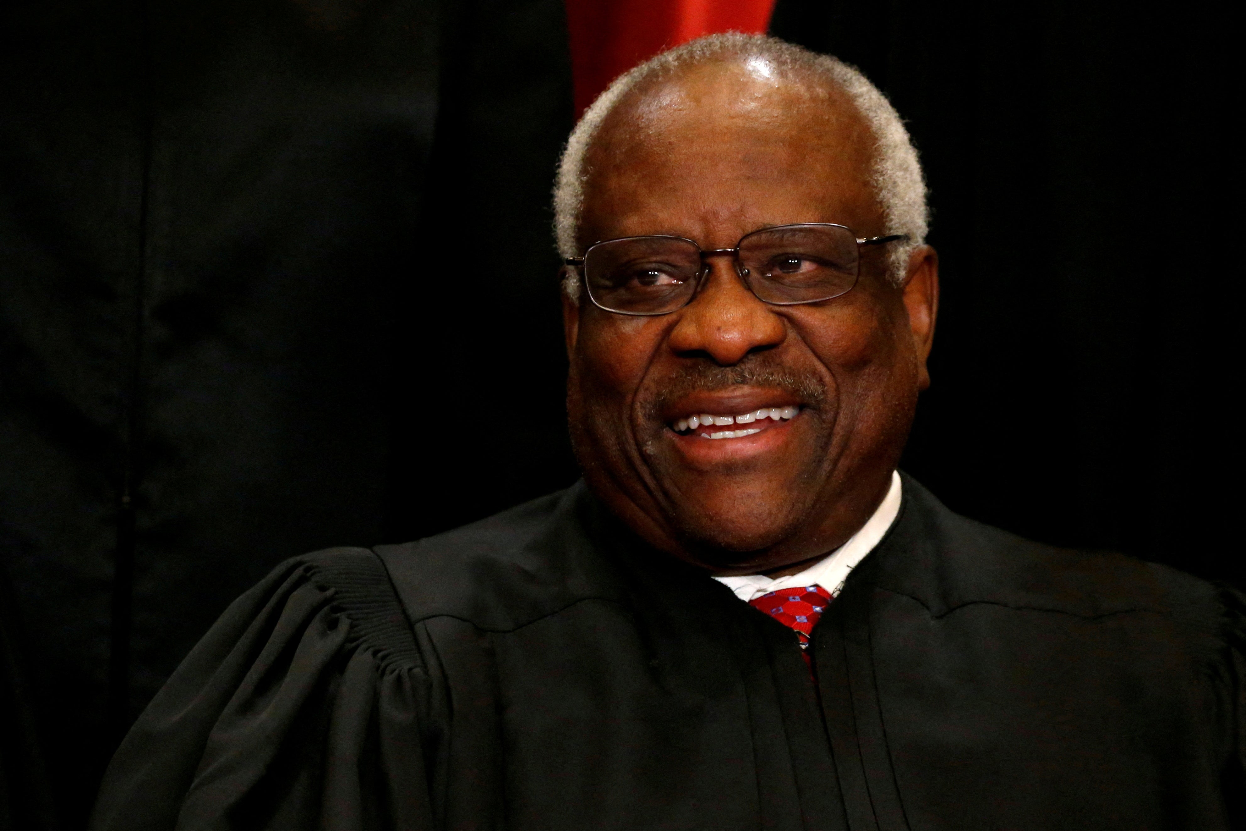 A senator says he has unearthed a new trip that Supreme Court Justice Clarence Thomas took with his wife, Ginni, on a wealthy friend’s private plane that was not disclosed.