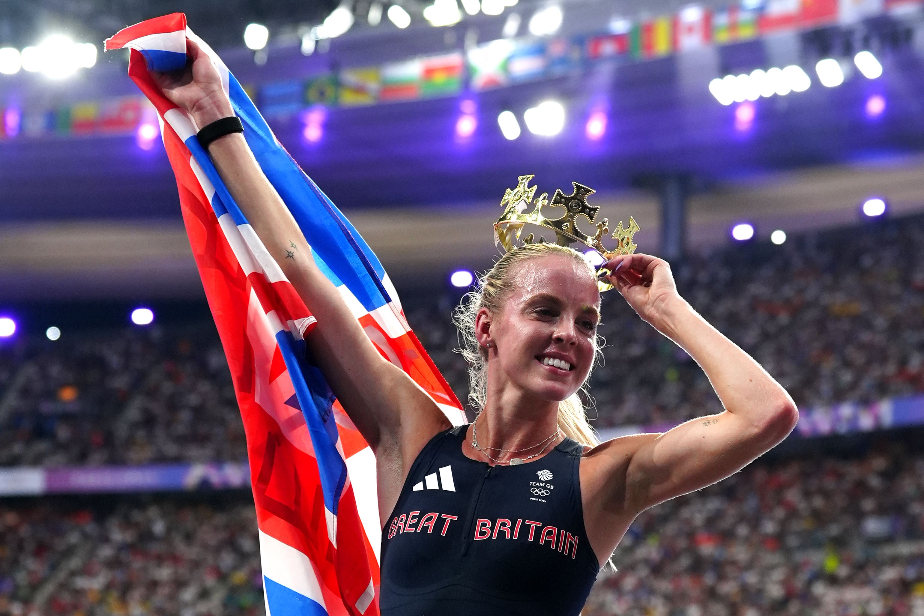 Keely Hodgkinson celebrates with a crown after winning gold (Peter Byrne/PA)