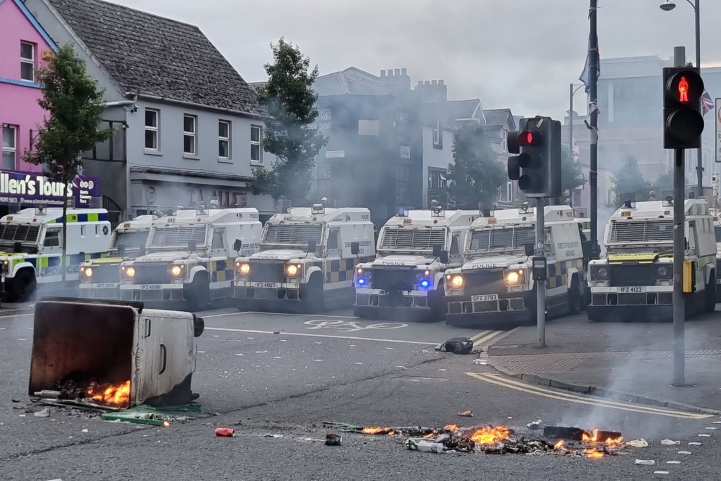 PSNI vehicles in Belfast following an anti-Islamic protest outside Belfast City Hall (PA)