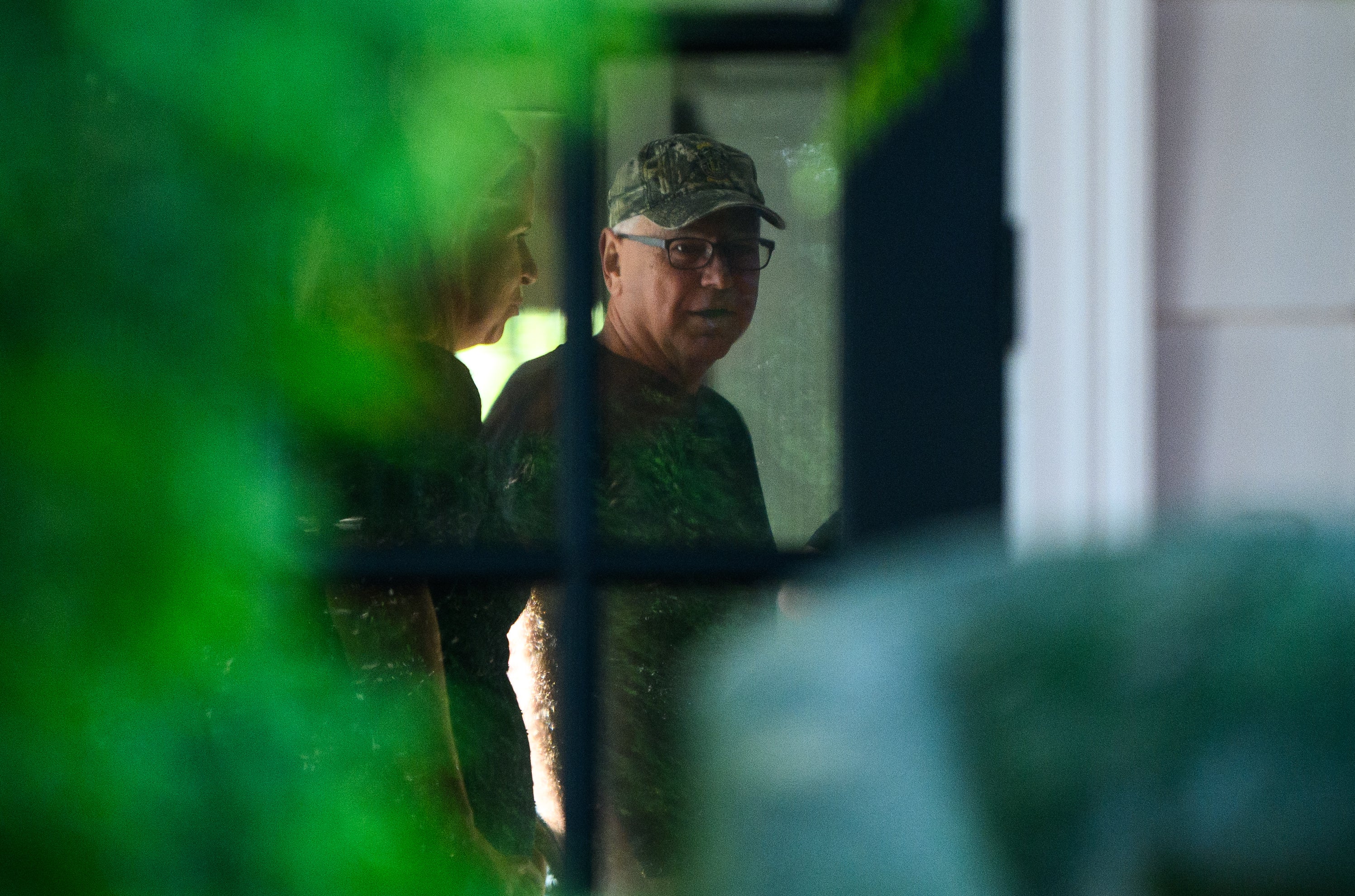 Democratic vice presidential nominee Minnesota Governor Tim Walz prepares to leave his home on Tuesday