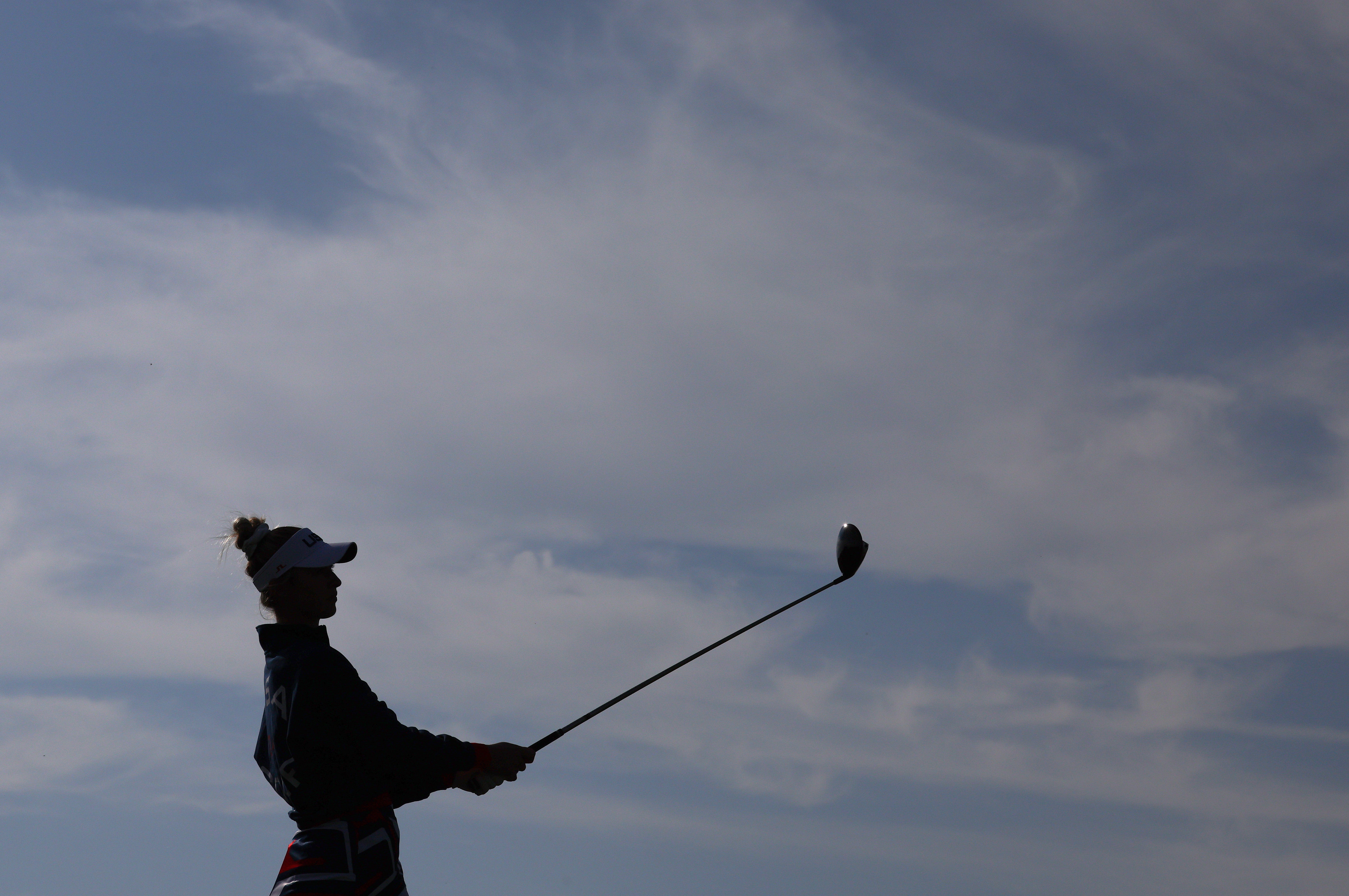 A silhouette of Nelly Korda of Team United States