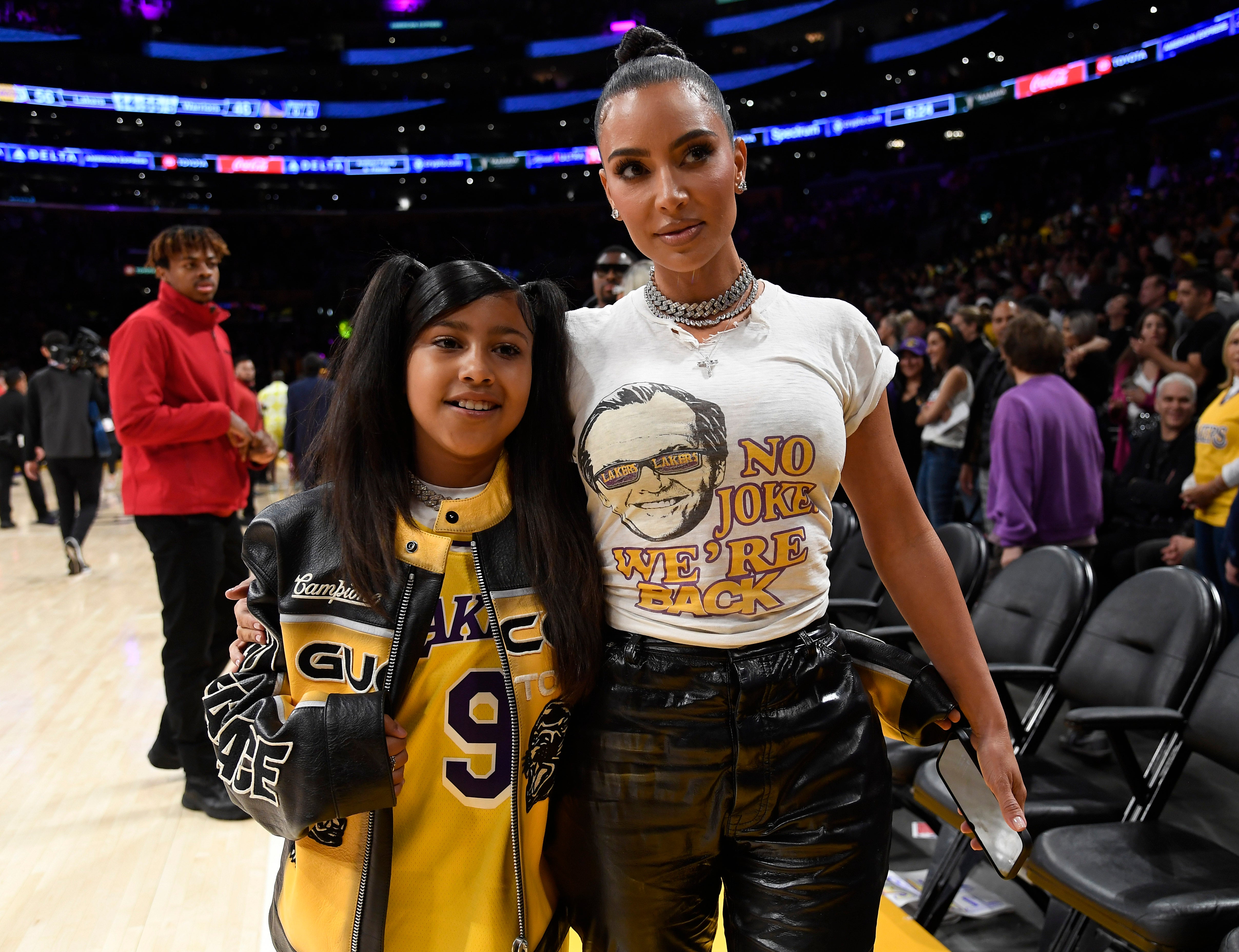 Kim Kardashian and daughter North West attend the Western Conference Semifinal Playoff game on 12 May 2023 in Los Angeles