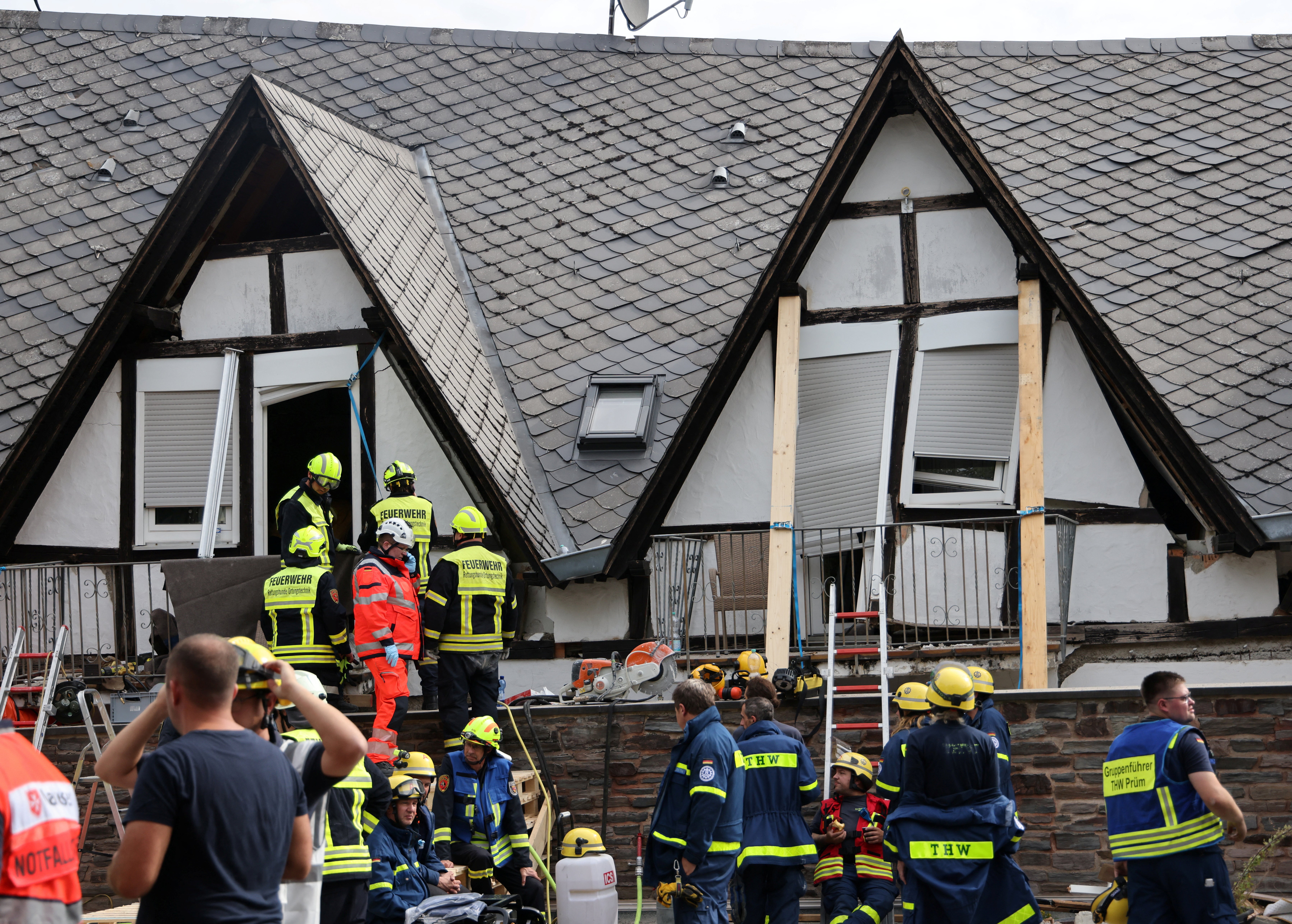 Emergency responders are working to rescue the two remaining survivors trapped under the rubble