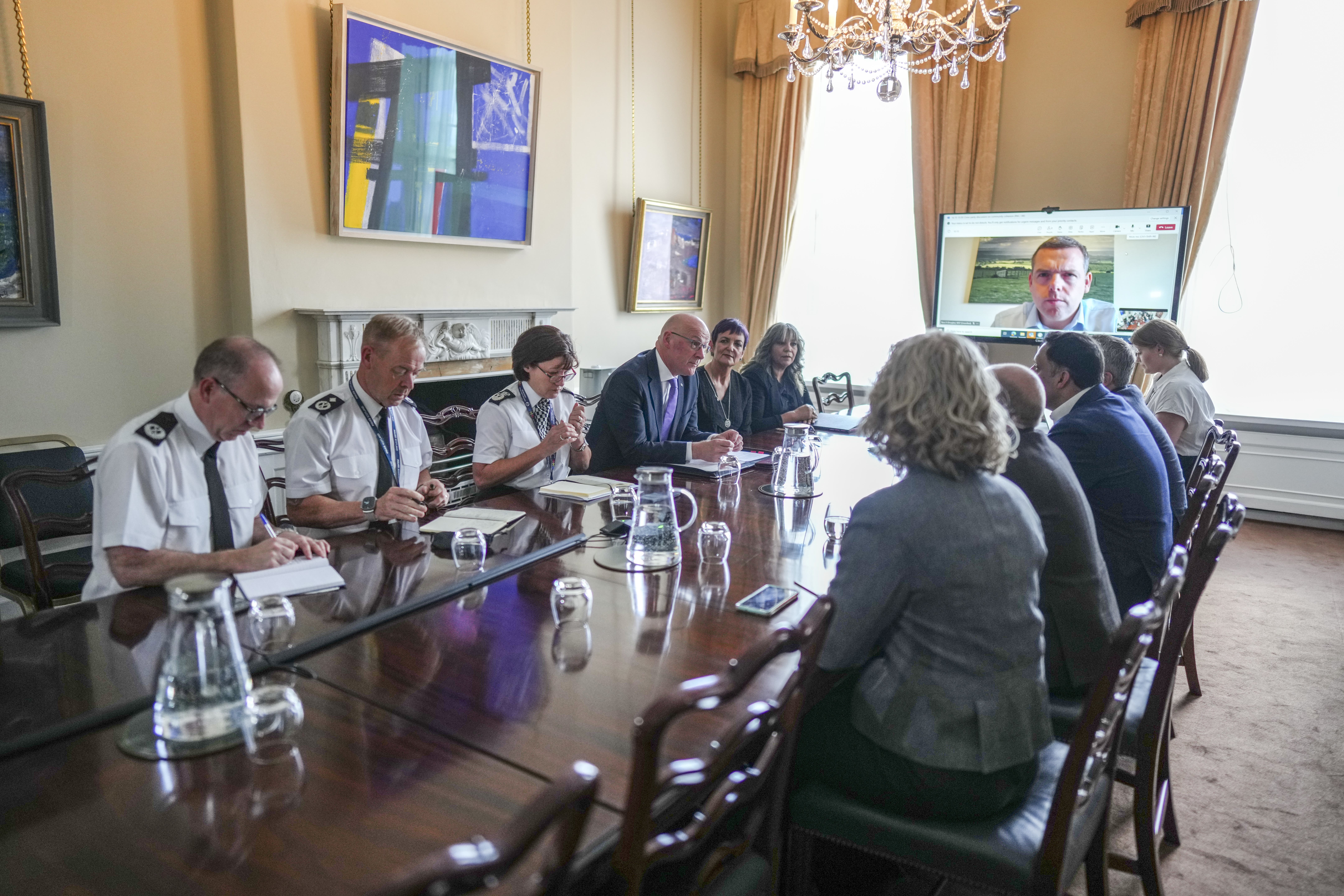 First Minister John Swinney hosts a meeting with political party leaders and police officers at Bute House, Edinburgh (Pete Summers/PA)