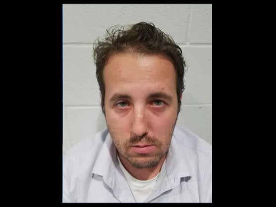 Andrew Buchanan, 38, was arrested after he allegedly threatened to carry out a ‘mass casualty event’ at the annual Army-Navy game and to shoot up the campus of Bryant University in Rhode Island