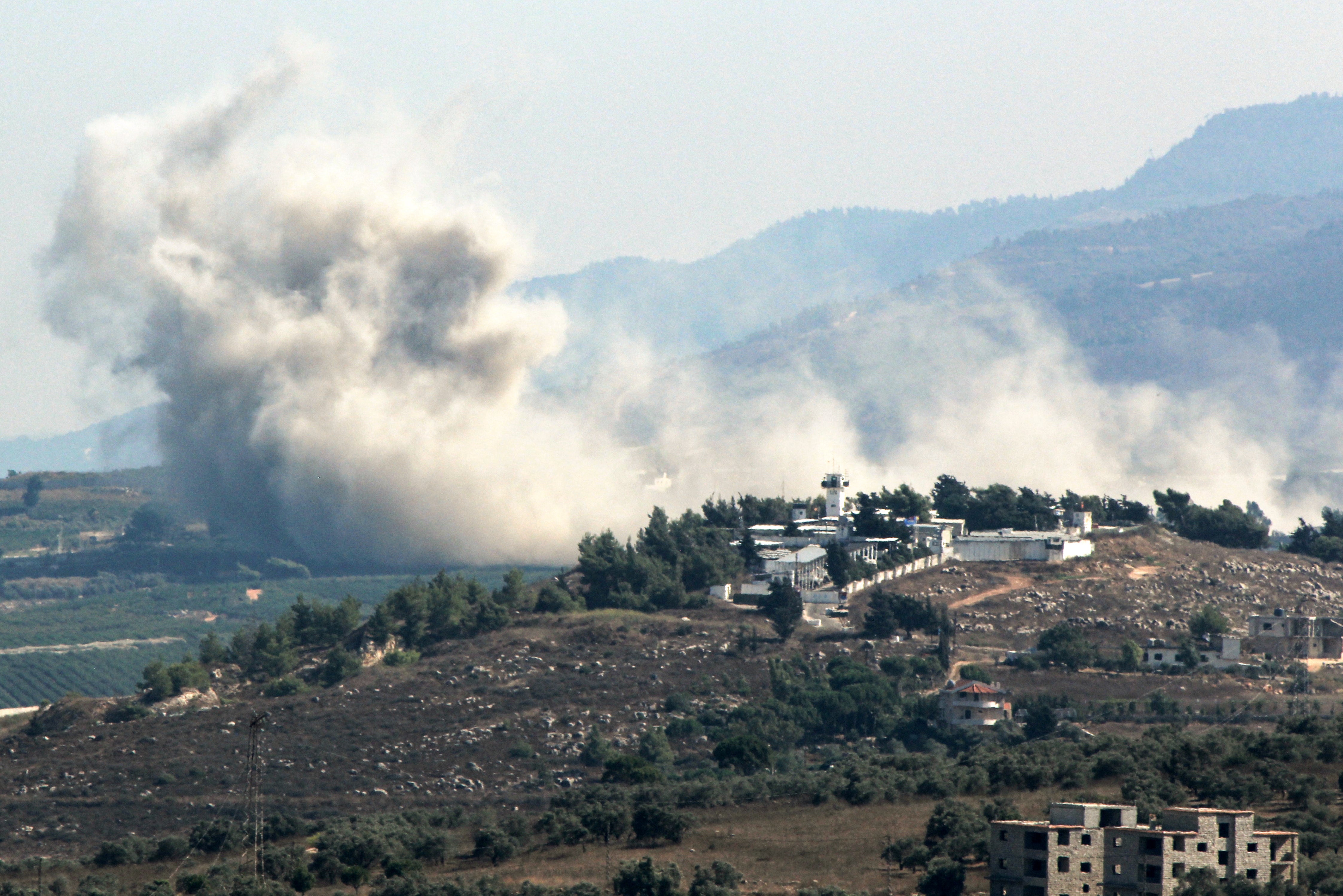 Smoke billows from the site of an Israeli strike that targeted the southern Lebanese village of Kfar Kila