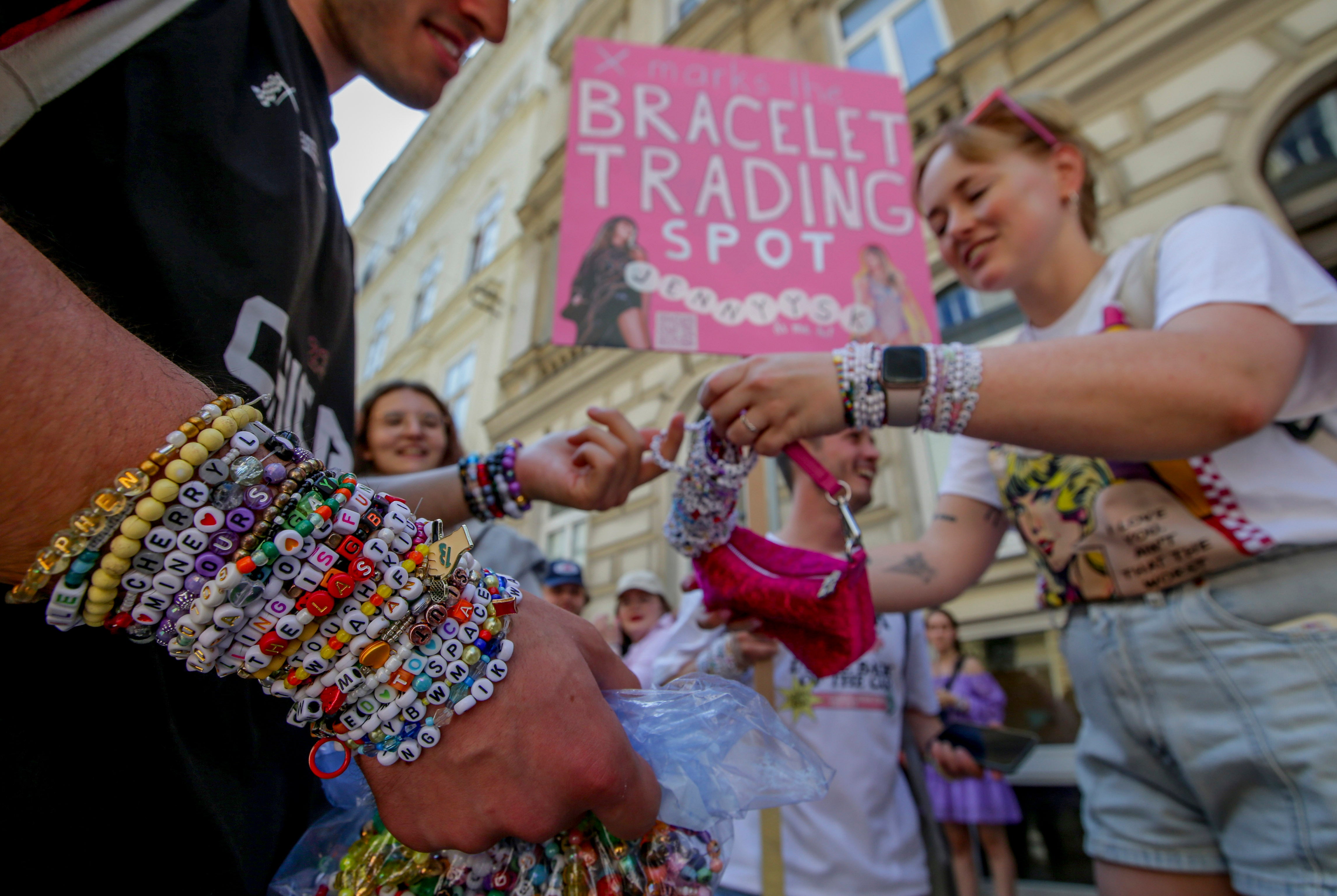Swifties trade bracelets in the city centre in Vienna on Thursday, 8 August, 2024