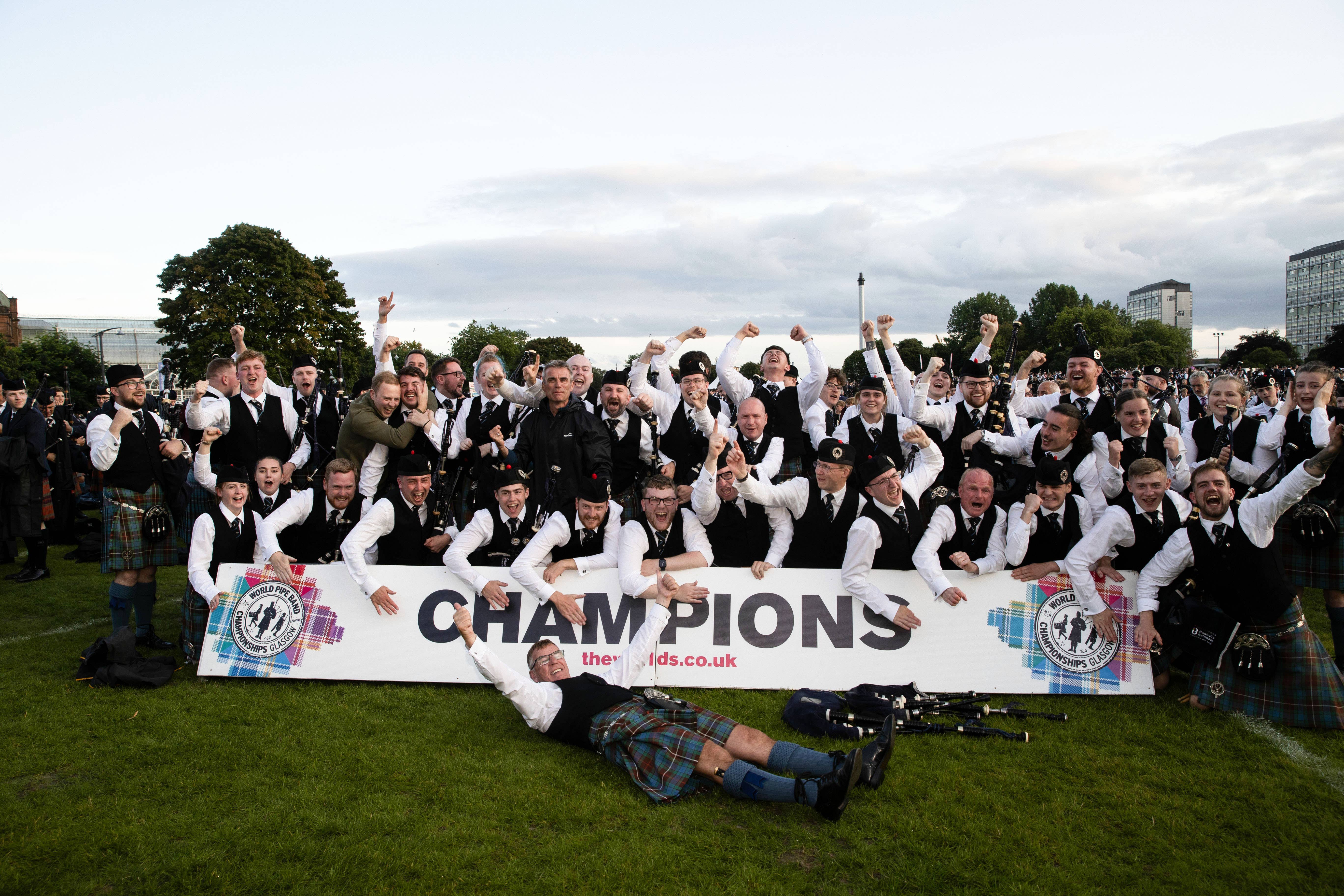 Boghall and Bathgate Caledonia Pipe Band celebrates winning the World Pipe Band Championships on Glasgow Green (Alan Harvey/SNS Group/PA Wire)