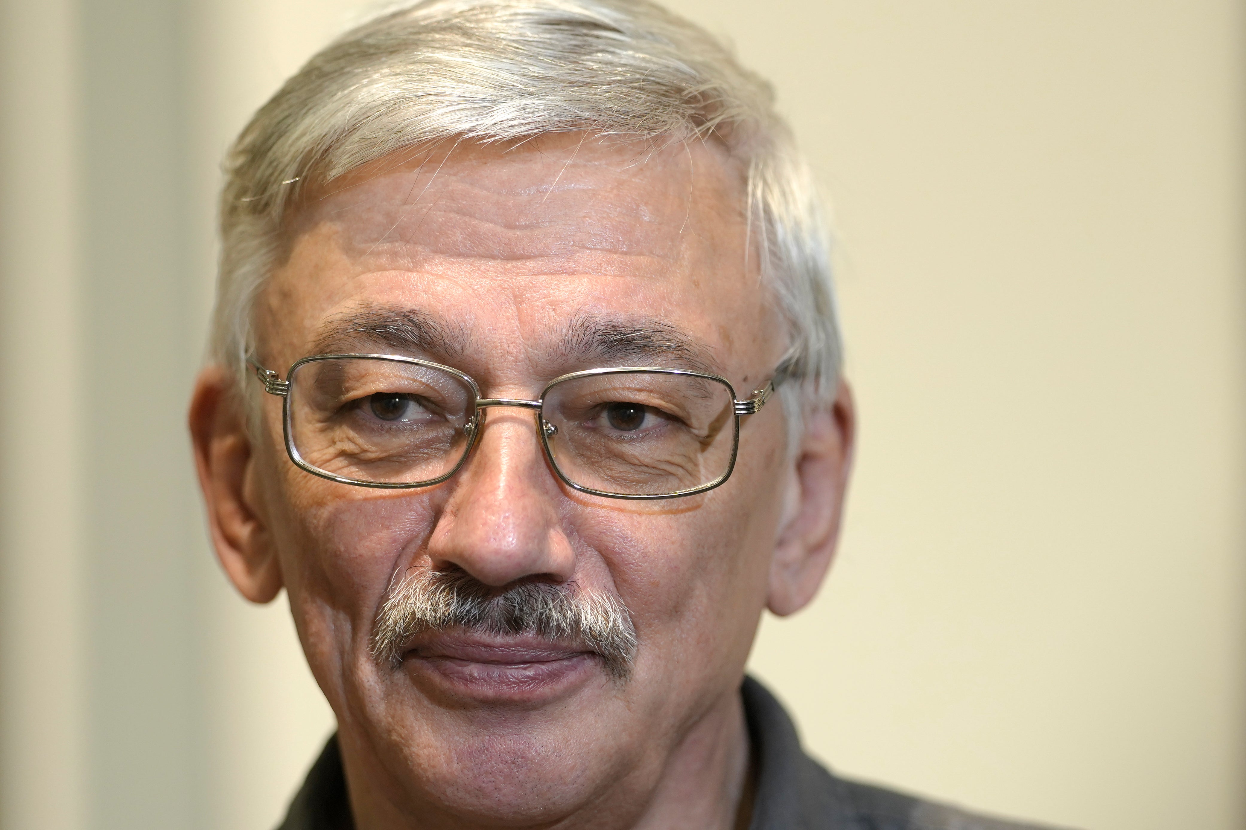 Oleg Orlov, the co-chair of the Nobel Peace Prize-winning human rights group Memorial, listens to questions during an interview with The Associated Press in Berlin, Germany, 8 Aug 2024