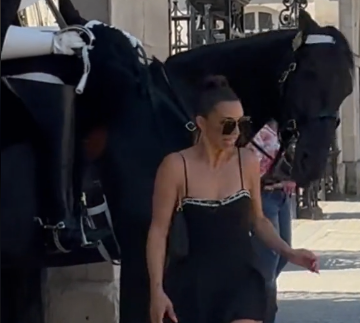 Shay was seen being nipped by the horse