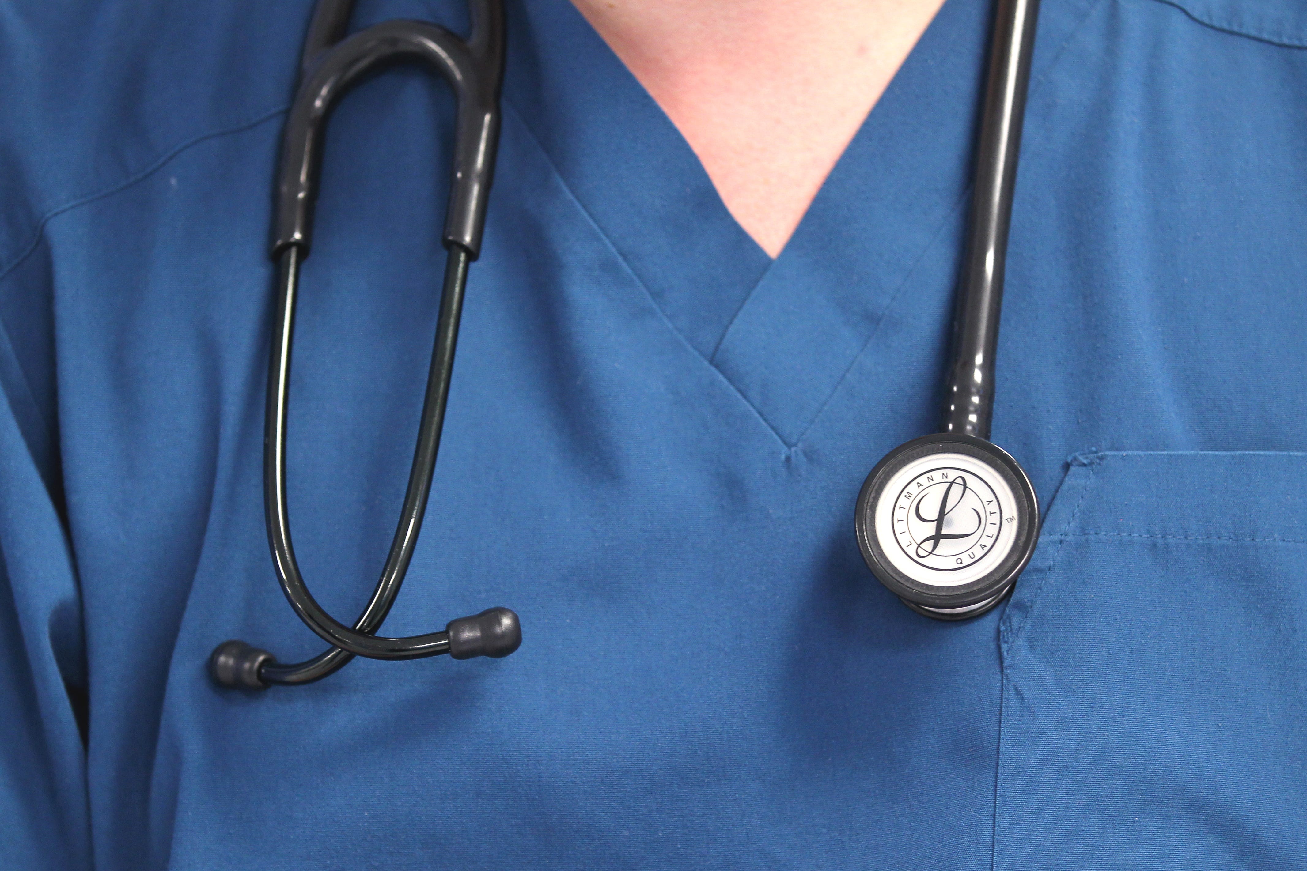 A doctor wearing a stethoscope (Lynne Cameron/PA)