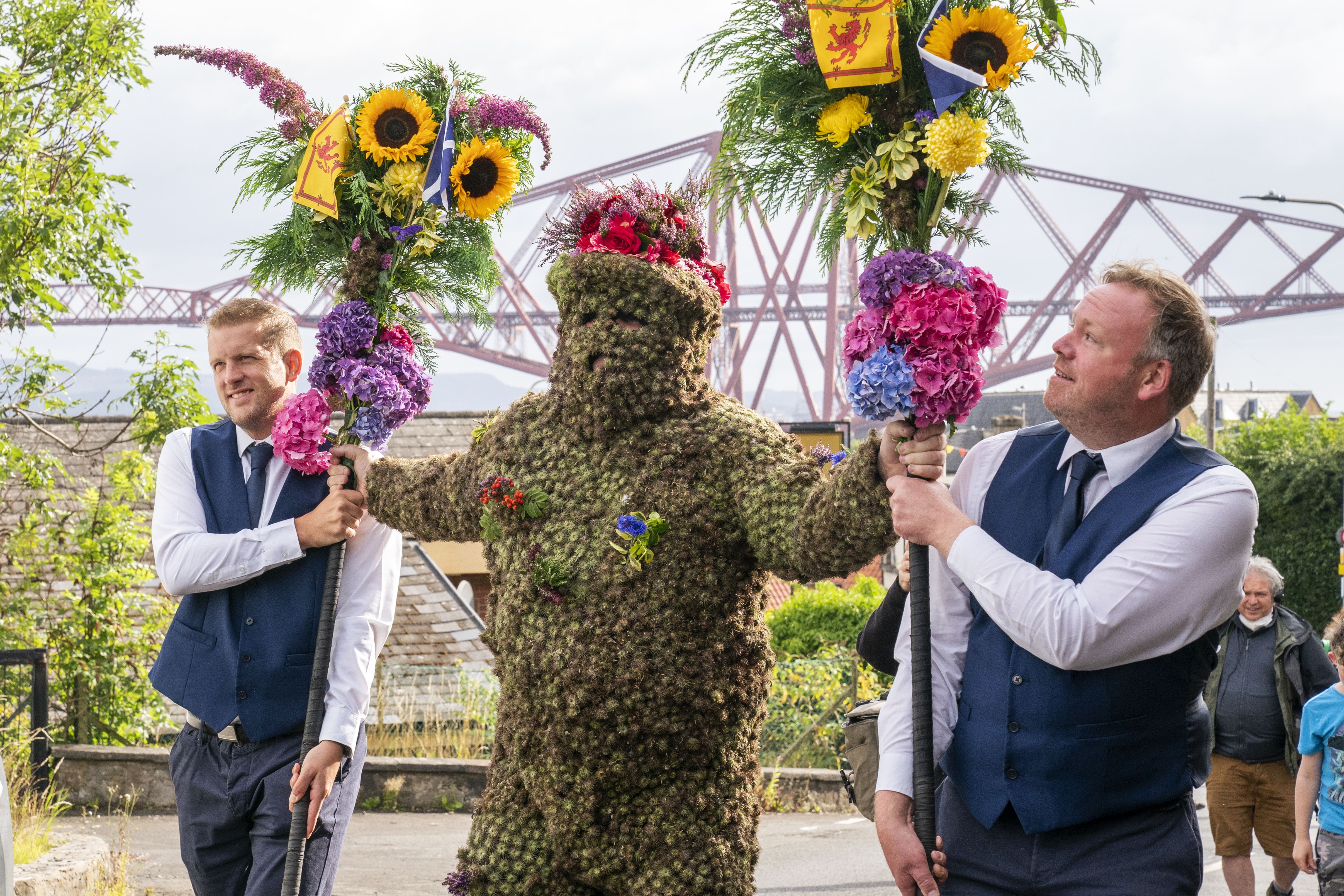 Locals have been celebrating the tradition of the Burryman’s parade in South Queensferry (Jane Barlow/PA)