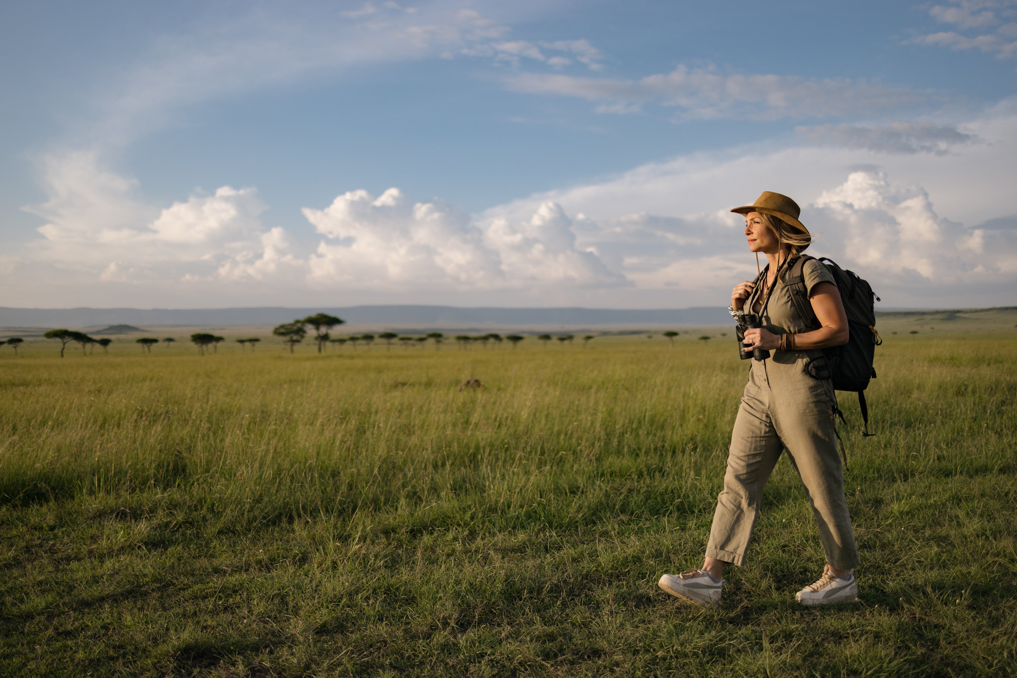 Wearing neutral, khaki and beige clothes with closed-toe shoes is reccomended while out on safari